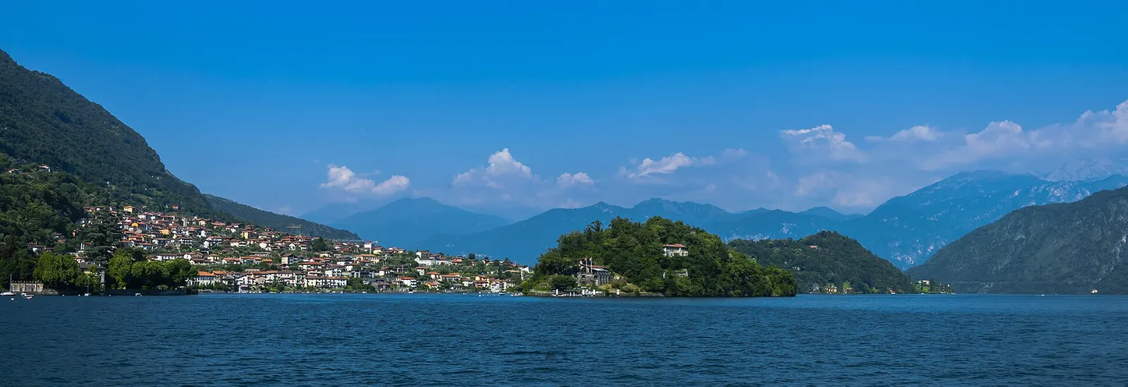 The wooded Isola Comacina in Lake Como seen from above, Italy