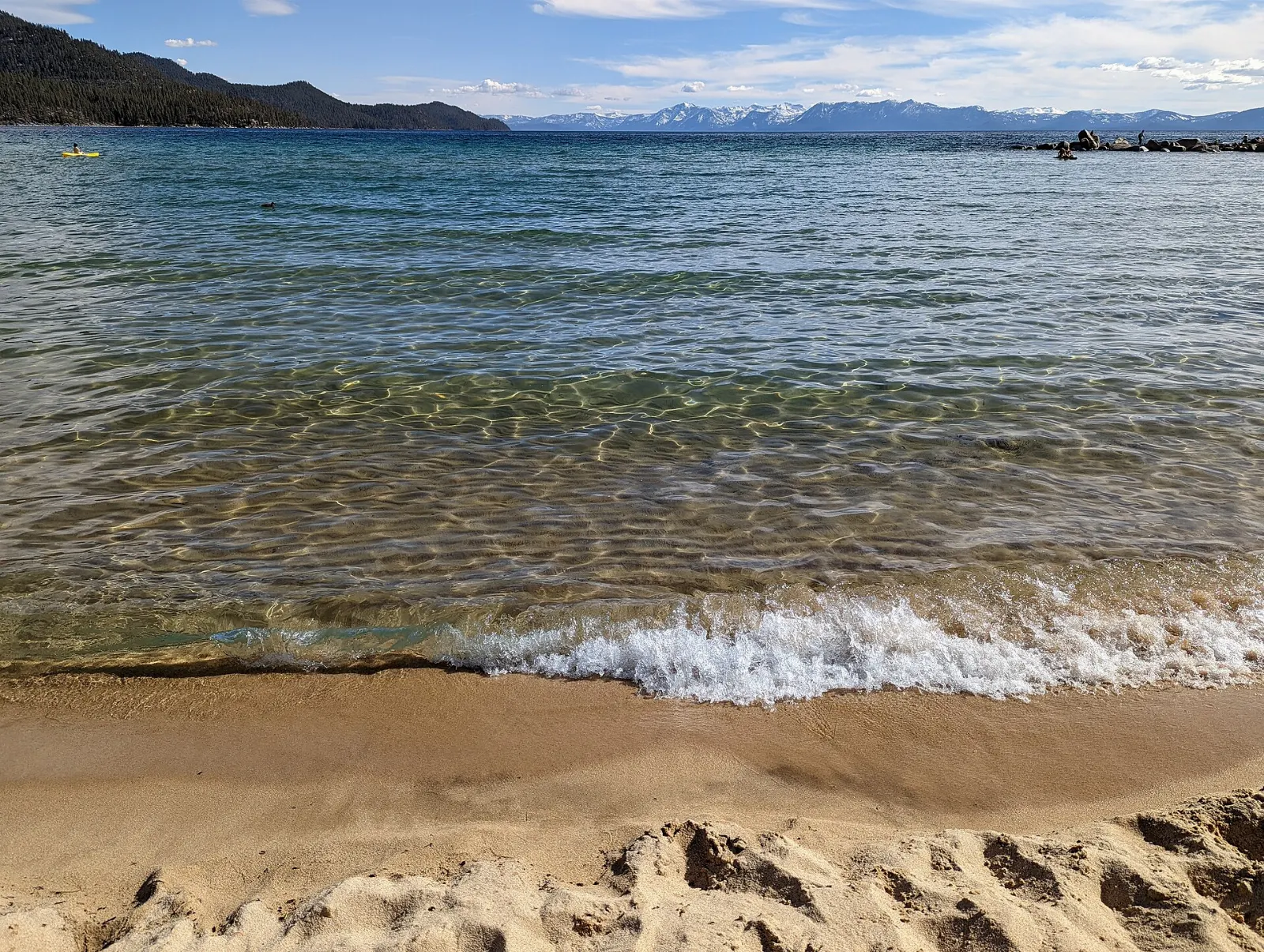 Smooth granite boulders in shallow turquoise water at Sand Harbor, Lake Tahoe, California and Nevada