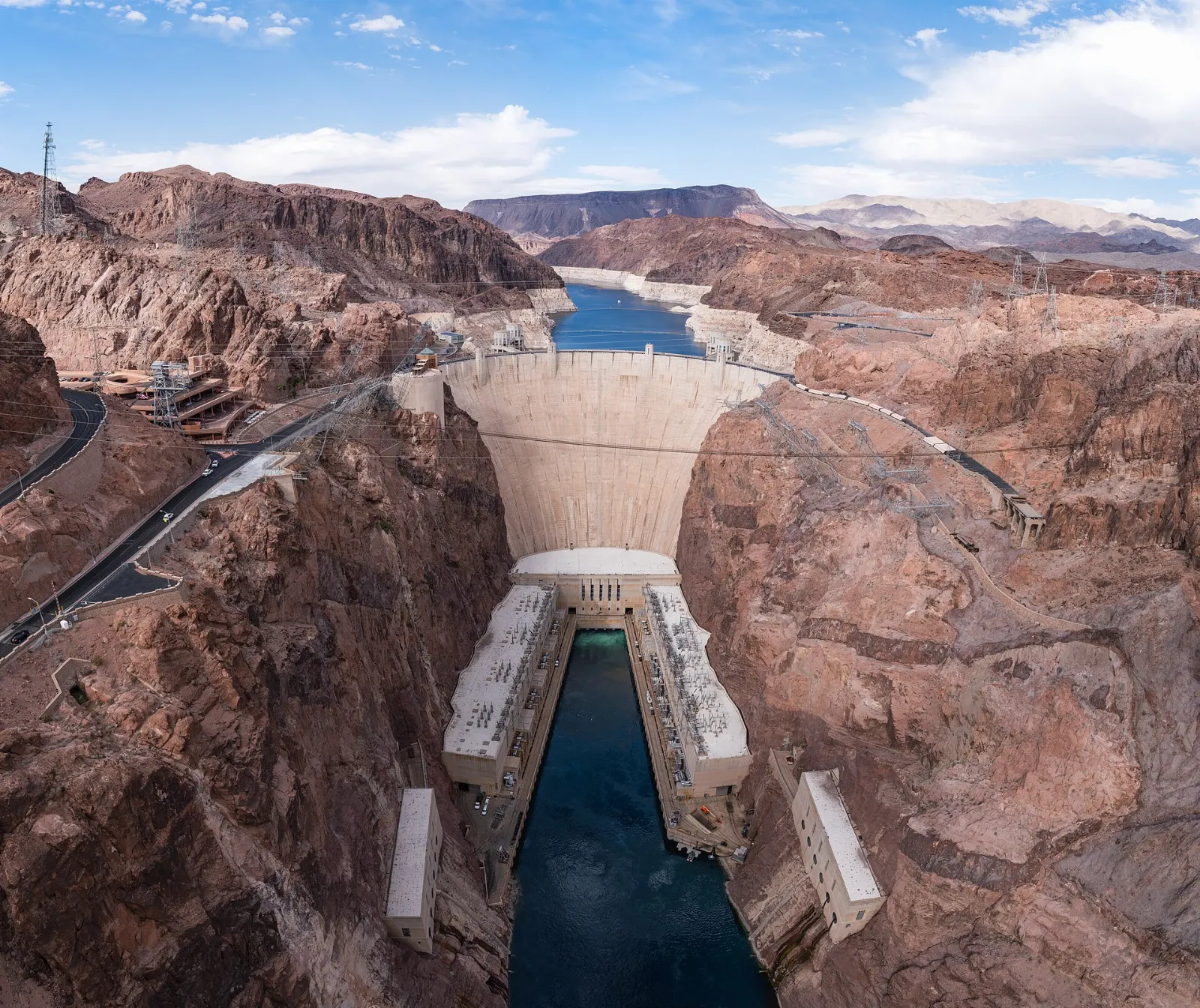 The curved concrete wall of Hoover Dam in a deep desert canyon, Las Vegas, Nevada