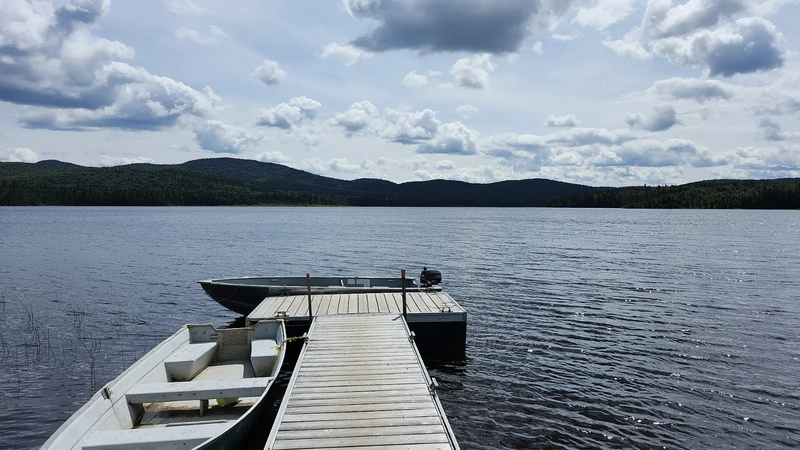 A calm lake surrounded by forest in Mont-Tremblant National Park, Laurentians, Quebec