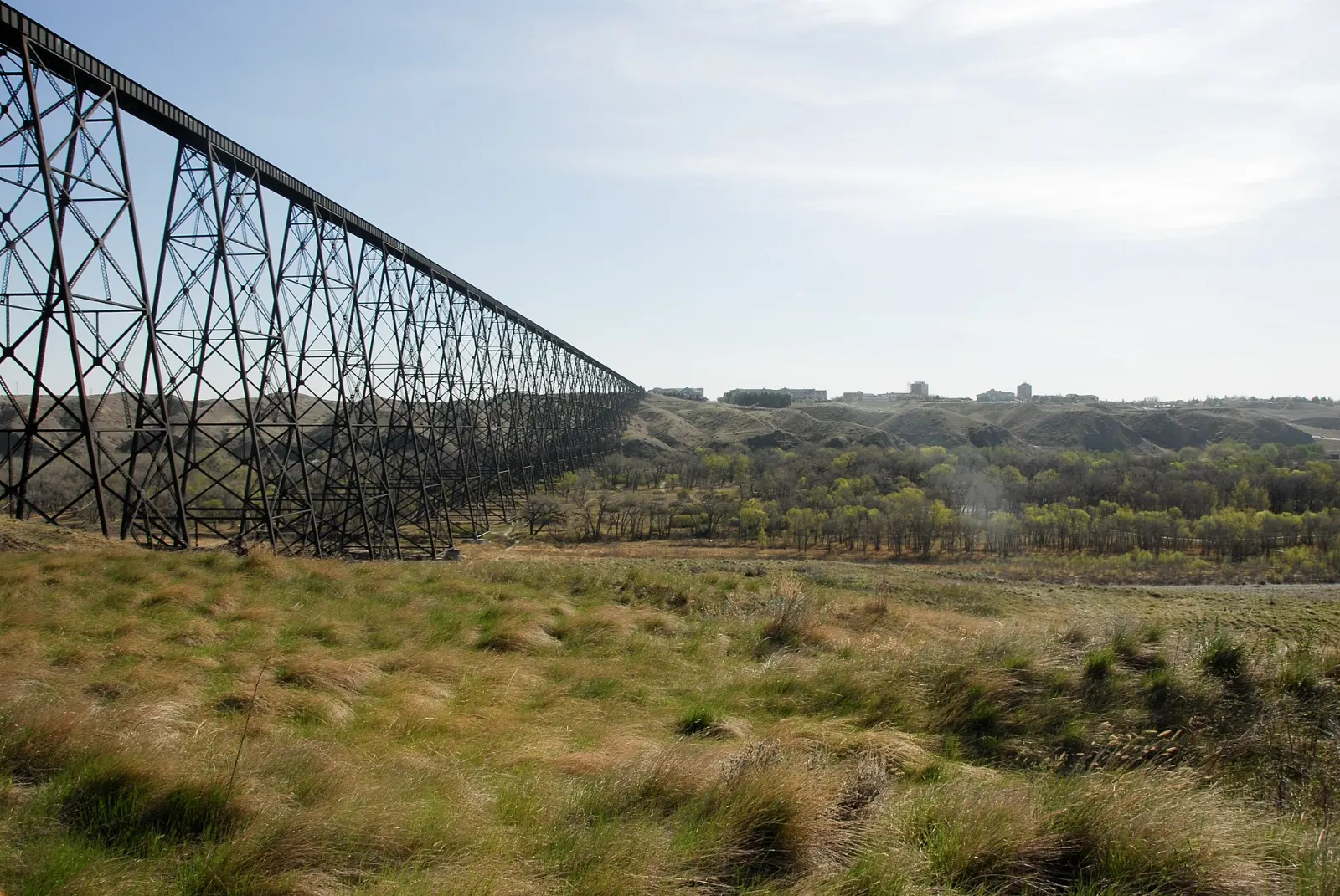 The long steel trestle of the High Level Bridge crossing the Oldman River valley in Lethbridge, Alberta