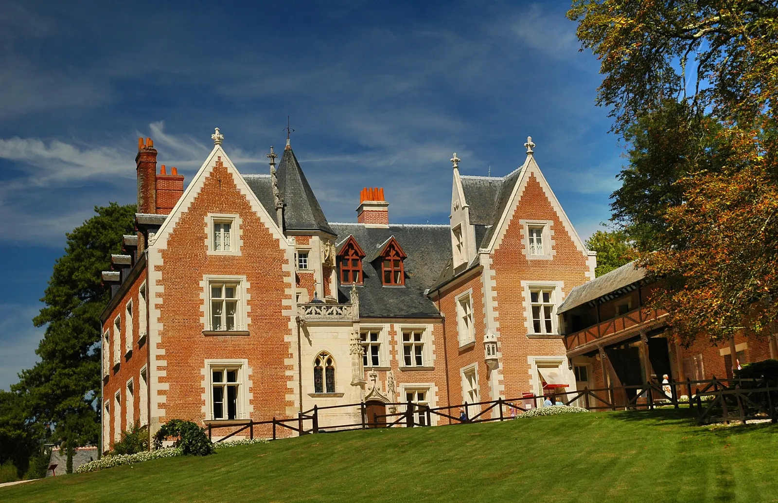 The red brick and stone manor of Clos Lucé surrounded by gardens, Loire Valley, France