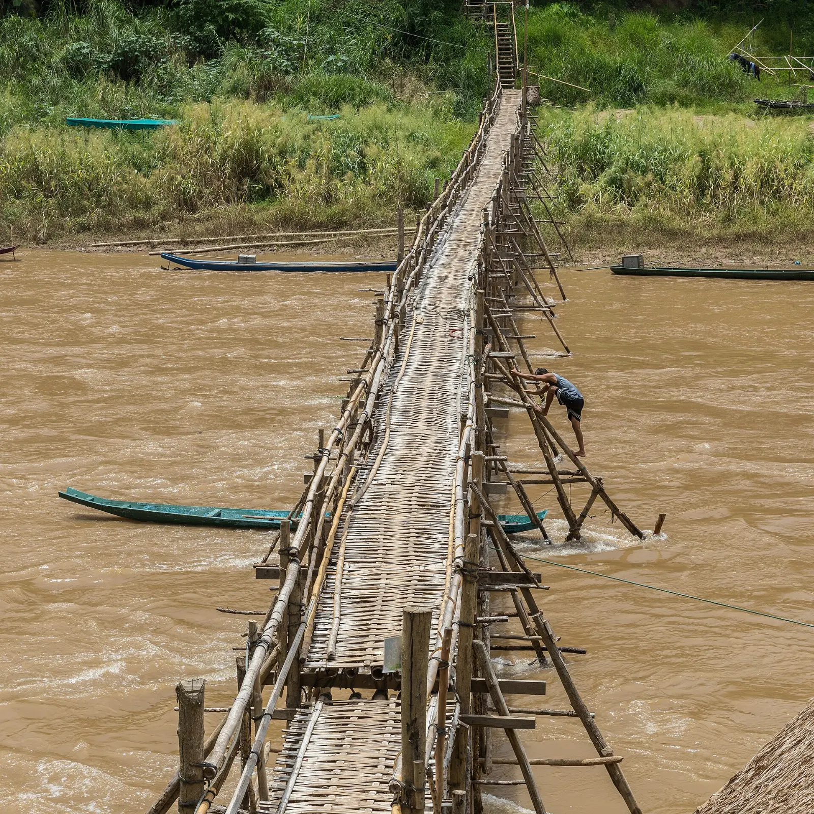 Nam Khan riverfront and the bamboo bridge, Luang Prabang, Laos