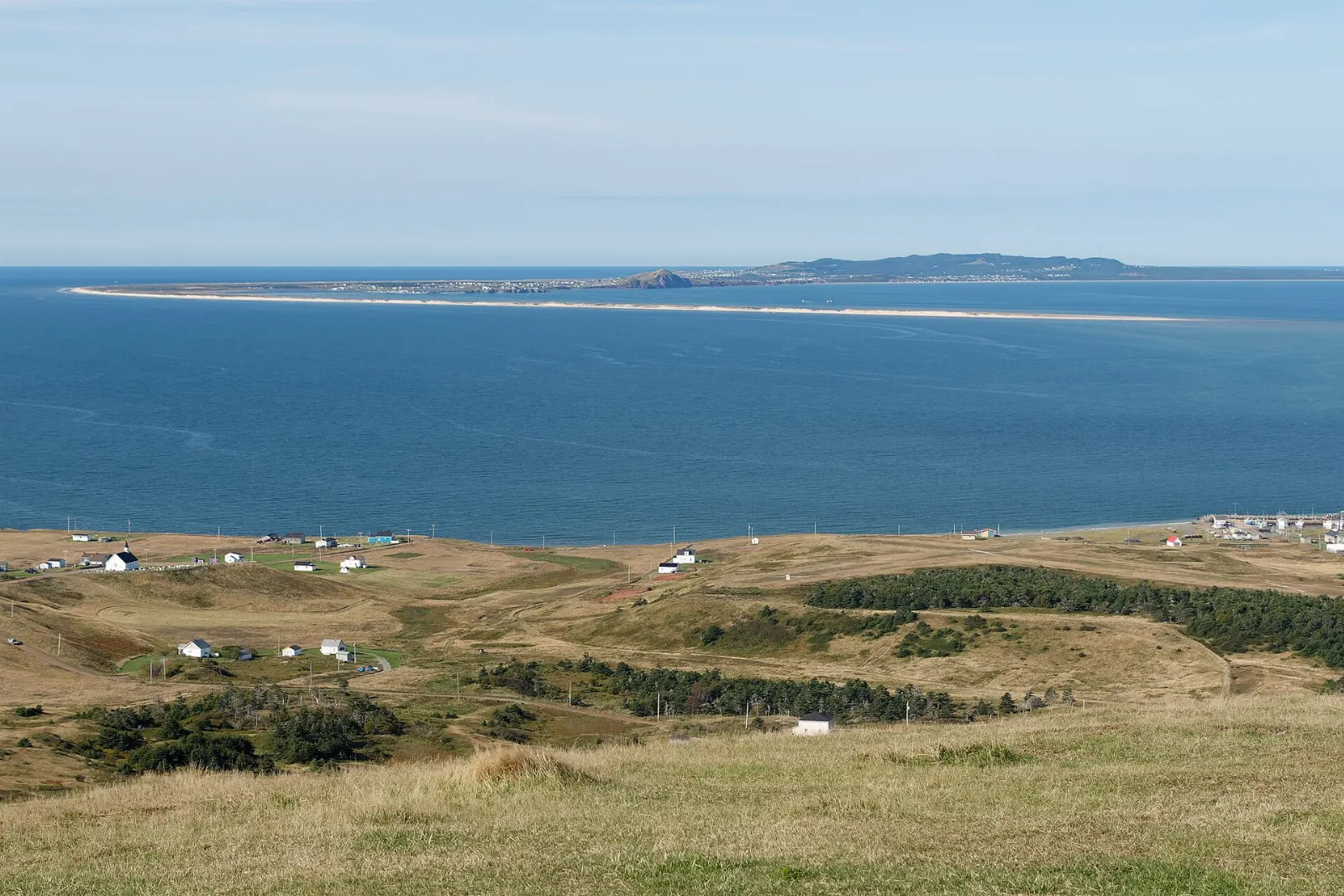 Historic fishing village of La Grave with wooden buildings on the waterfront in Havre-Aubert, Magdalen Islands, Quebec