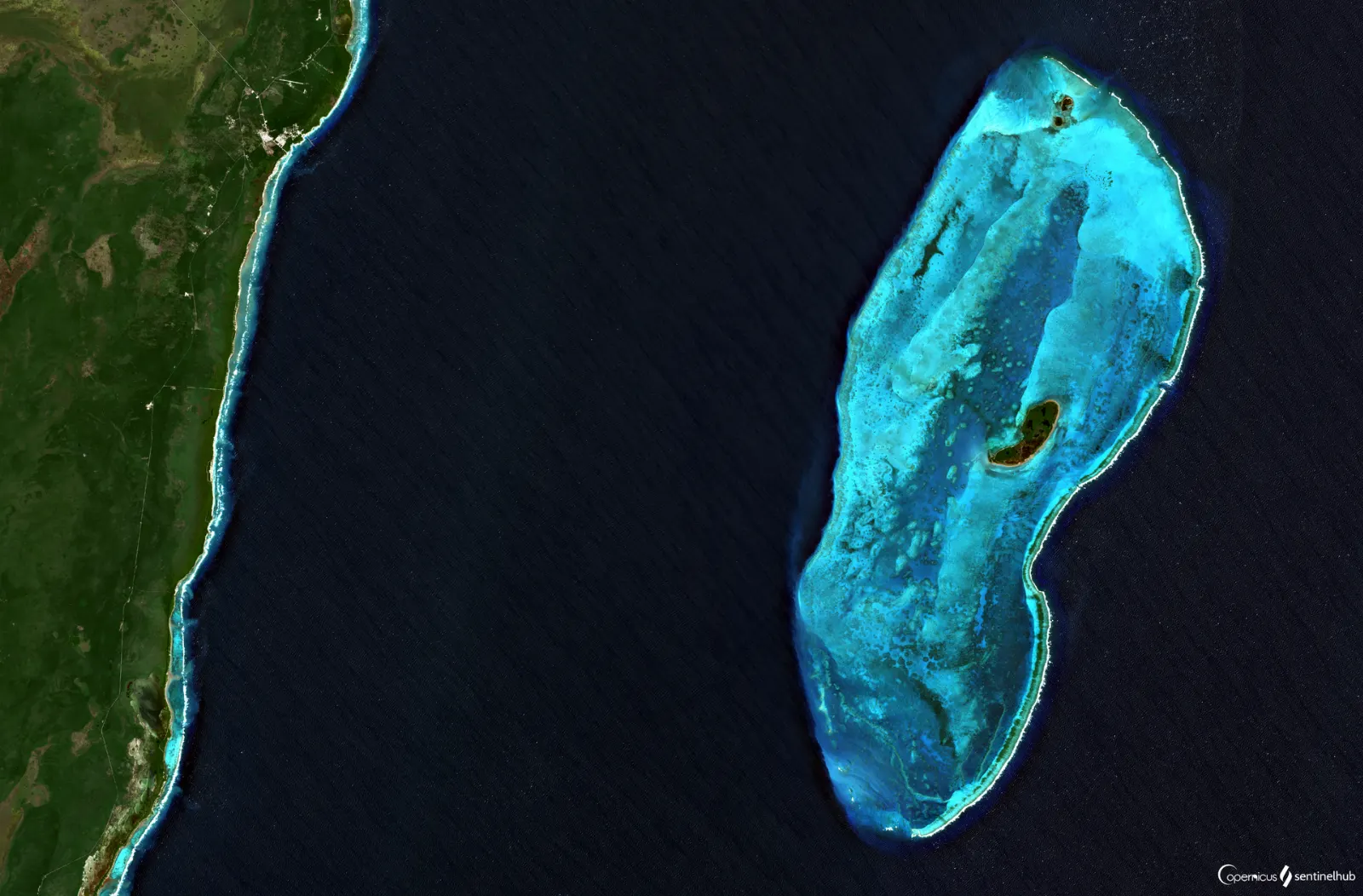 Reef water and a small cay at Banco Chinchorro off the Quintana Roo coast, Mahahual, Quintana Roo