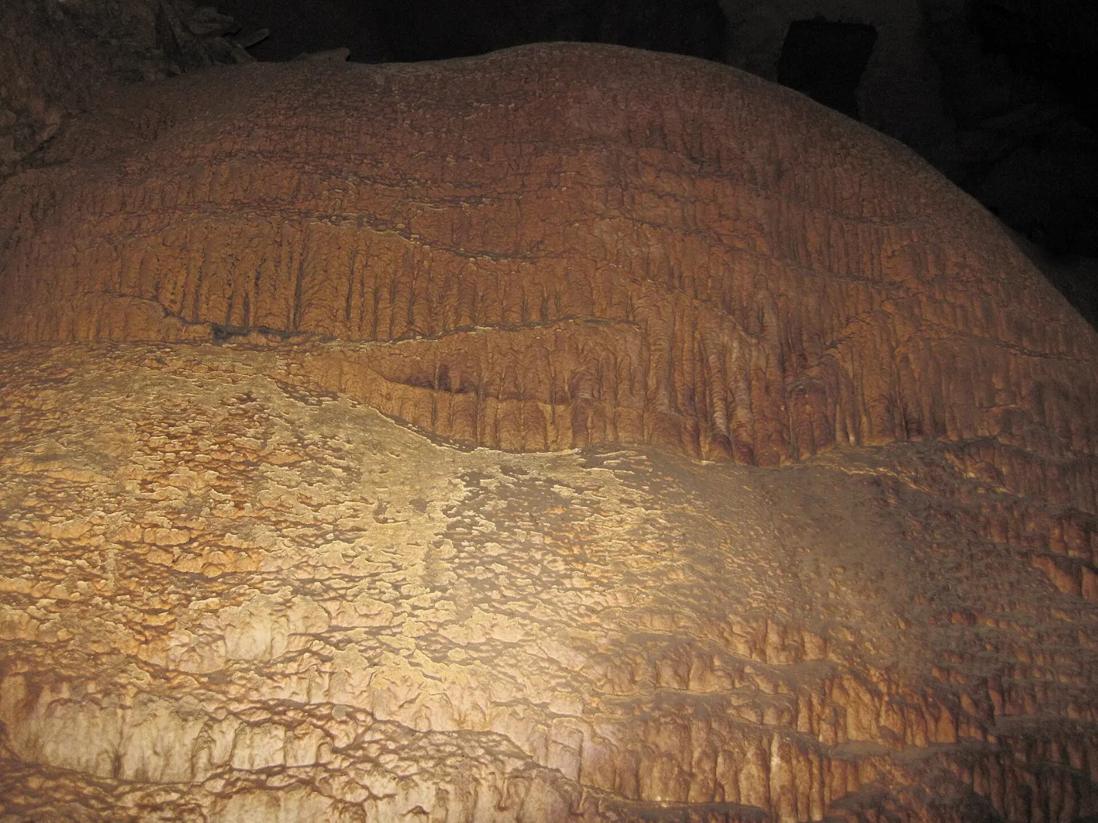 A massive flowstone formation resembling a frozen waterfall inside Mammoth Cave, Mammoth Cave National Park, Kentucky
