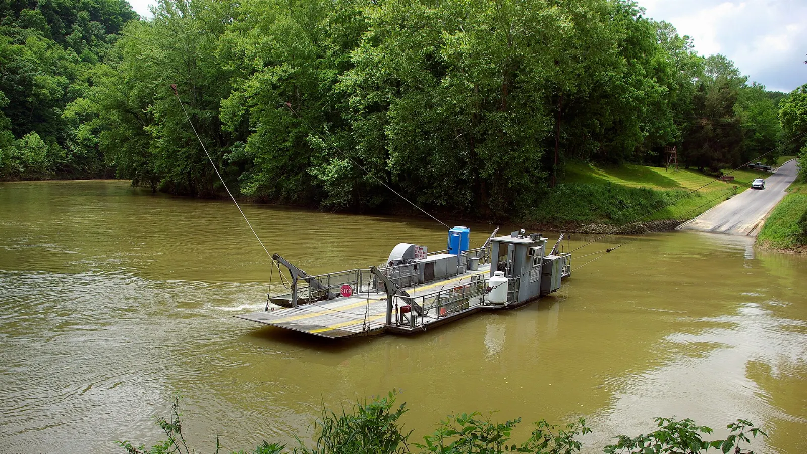 A small cable ferry carrying cars across the Green River, Mammoth Cave National Park, Kentucky
