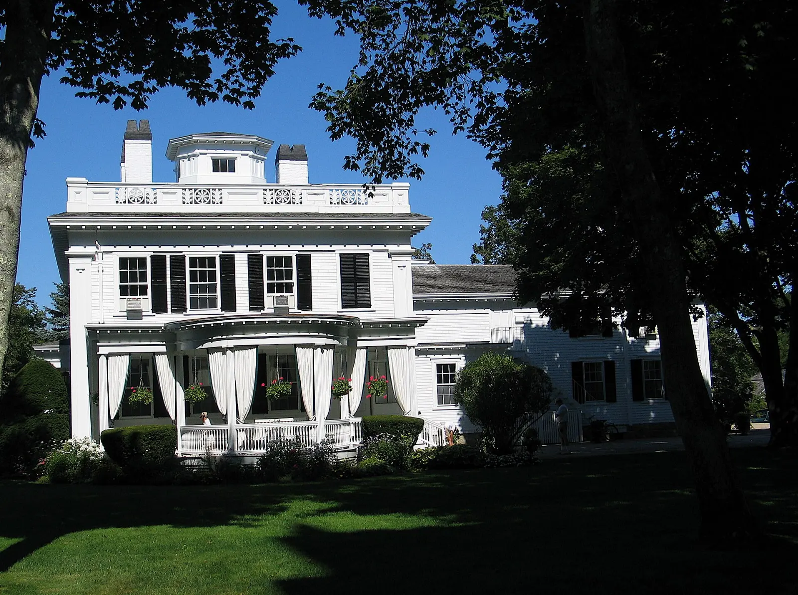 The tall white columned facade of the Old Whaling Church on Main Street in Edgartown, Martha's Vineyard, Massachusetts