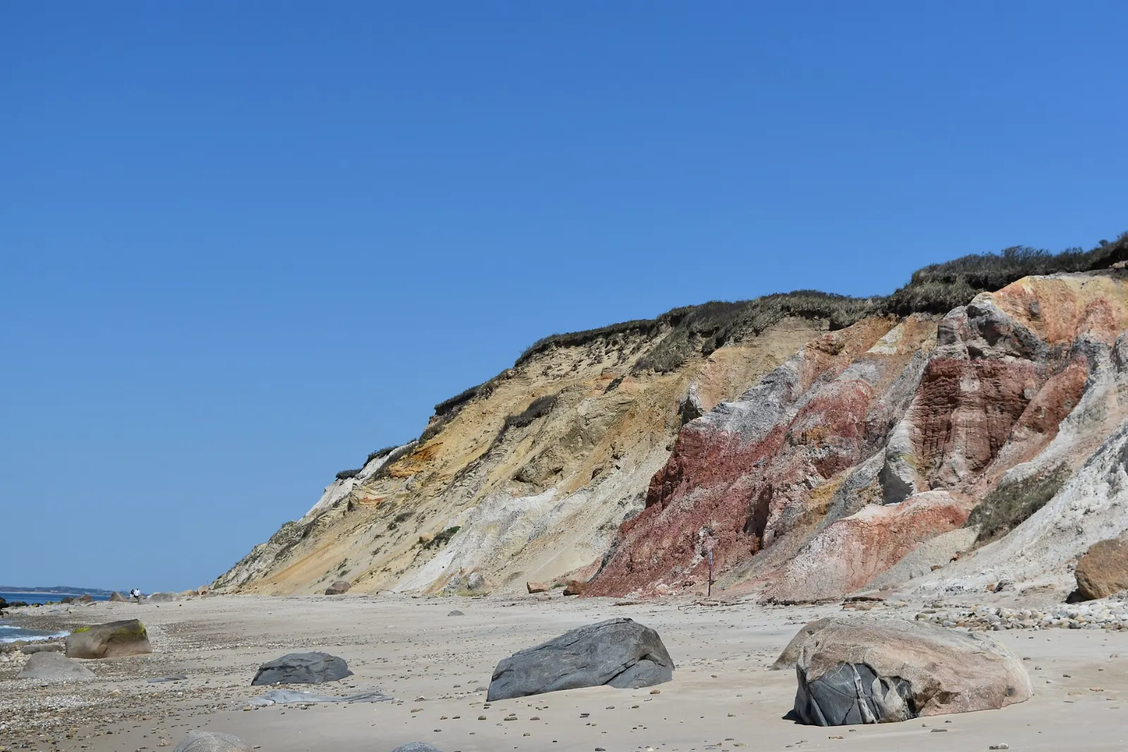 A long sandy beach and calm water beside the road between Oak Bluffs and Edgartown, Martha's Vineyard, Massachusetts