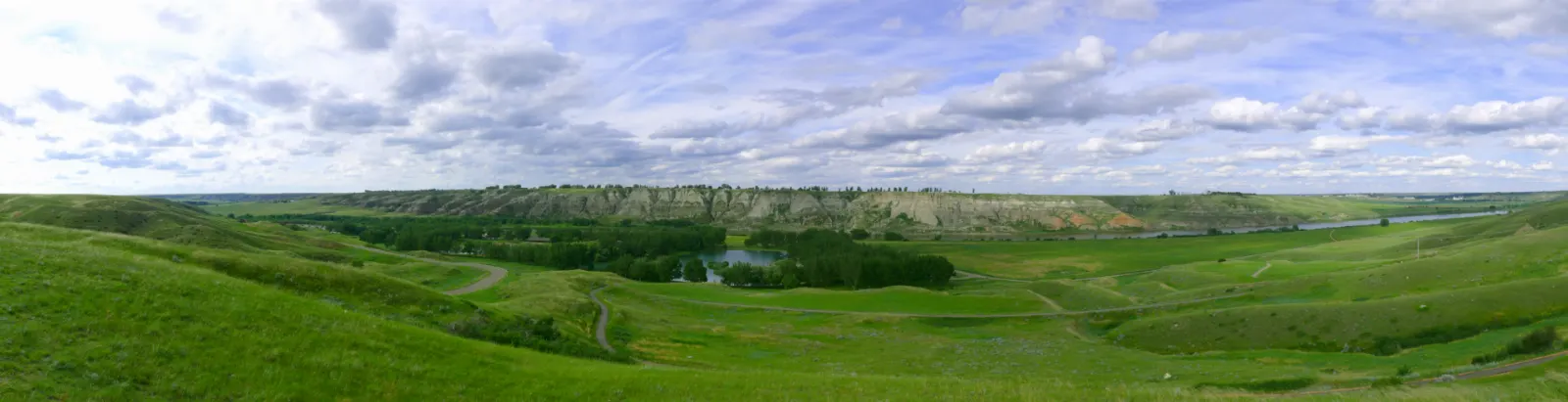 The swimming lake and trees at Echodale Regional Park, Medicine Hat, Alberta