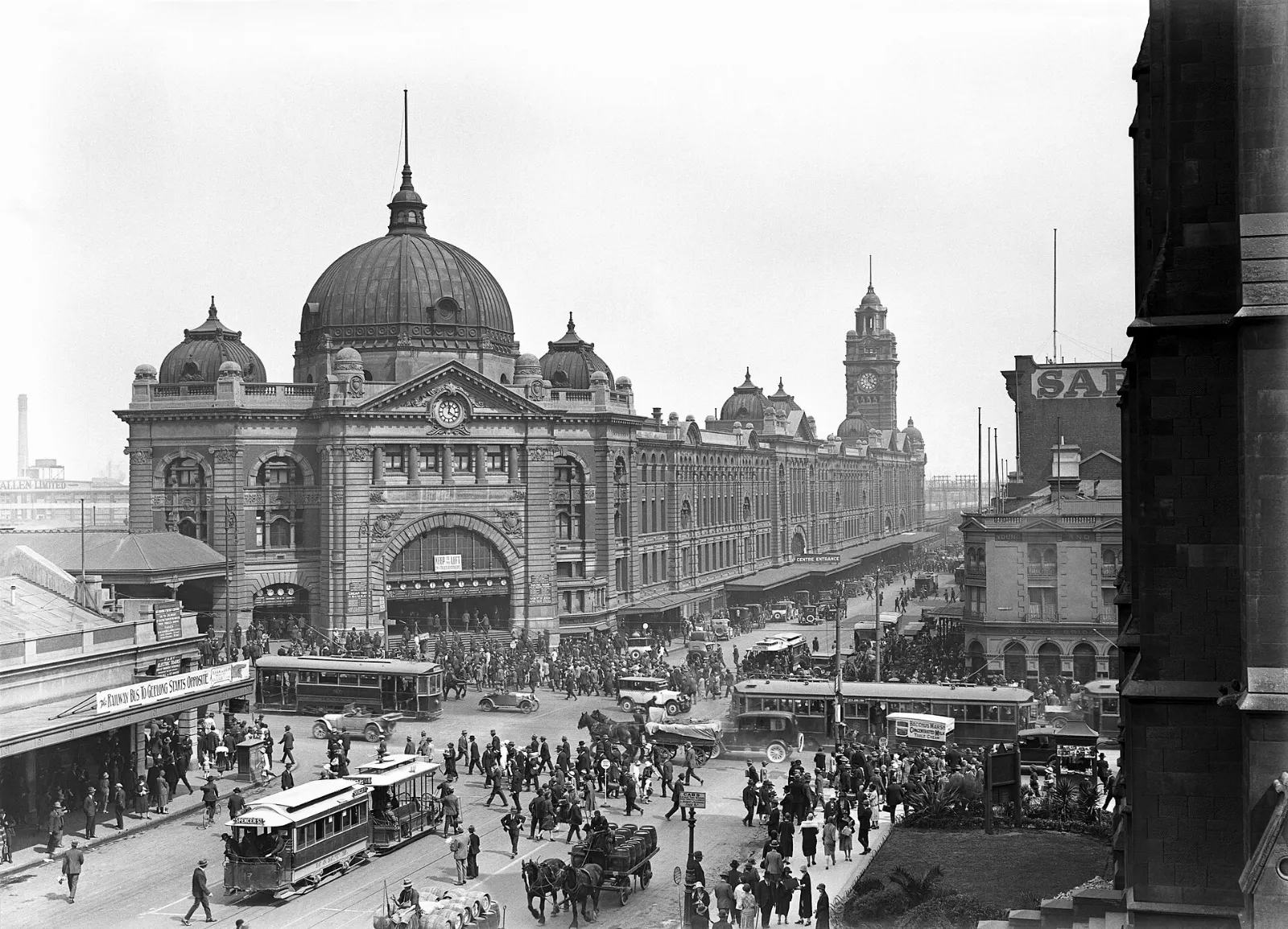 Yellow facade and green copper dome of Flinders Street Station, Melbourne, Australia