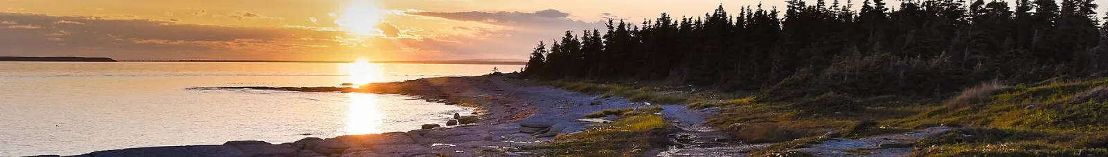 Lighthouse on Petite île au Marteau surrounded by water, Mingan Archipelago National Park Reserve, Quebec