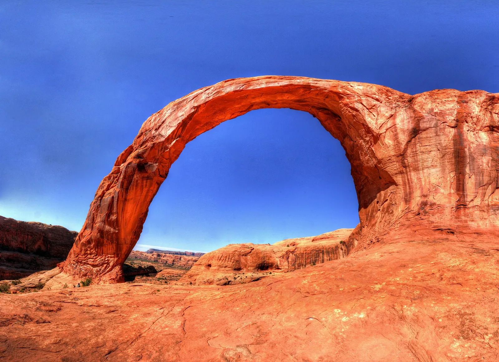 Corona Arch spanning a wide opening in a sandstone fin, Moab, Utah