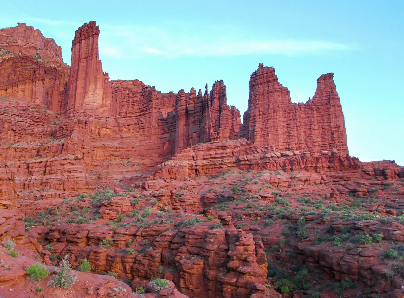 Tall, fluted red sandstone towers rising above the desert, Moab, Utah