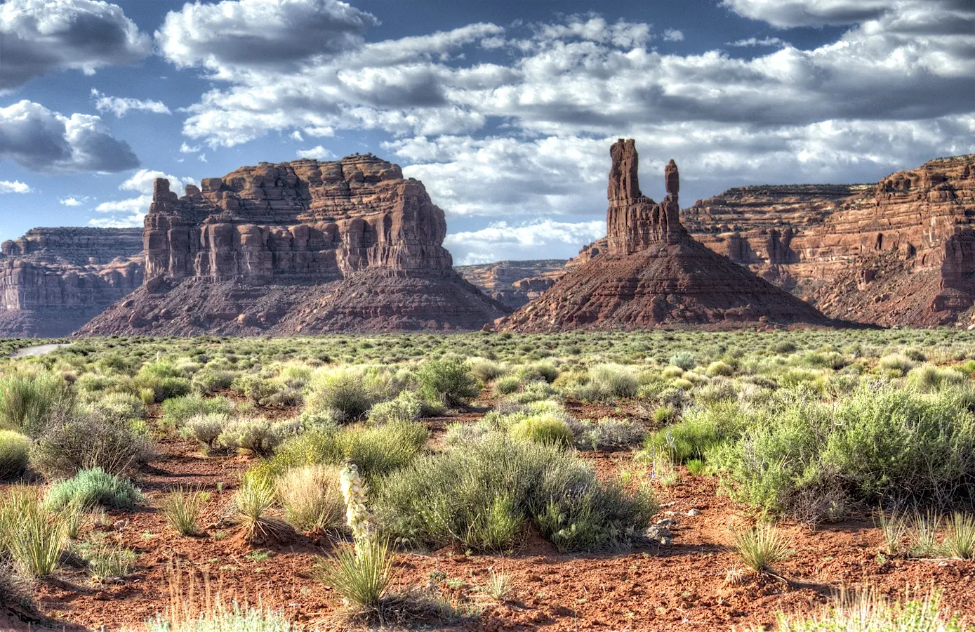 Sandstone towers and buttes along a gravel road in the Valley of the Gods, Monument Valley, Arizona and Utah