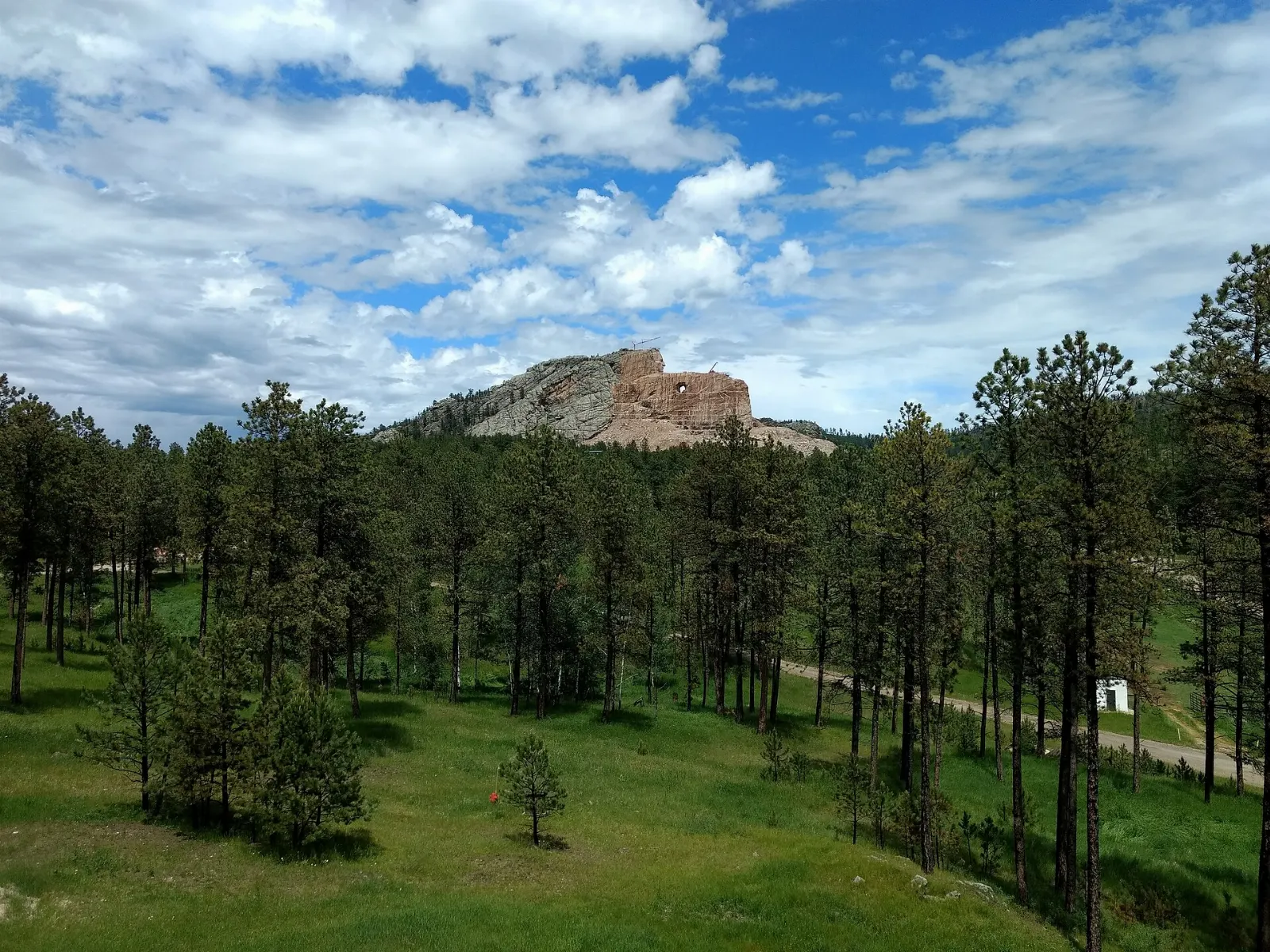 The carved face of Crazy Horse emerging from a granite mountain in the Black Hills, Mount Rushmore and the Black Hills, South Dakota