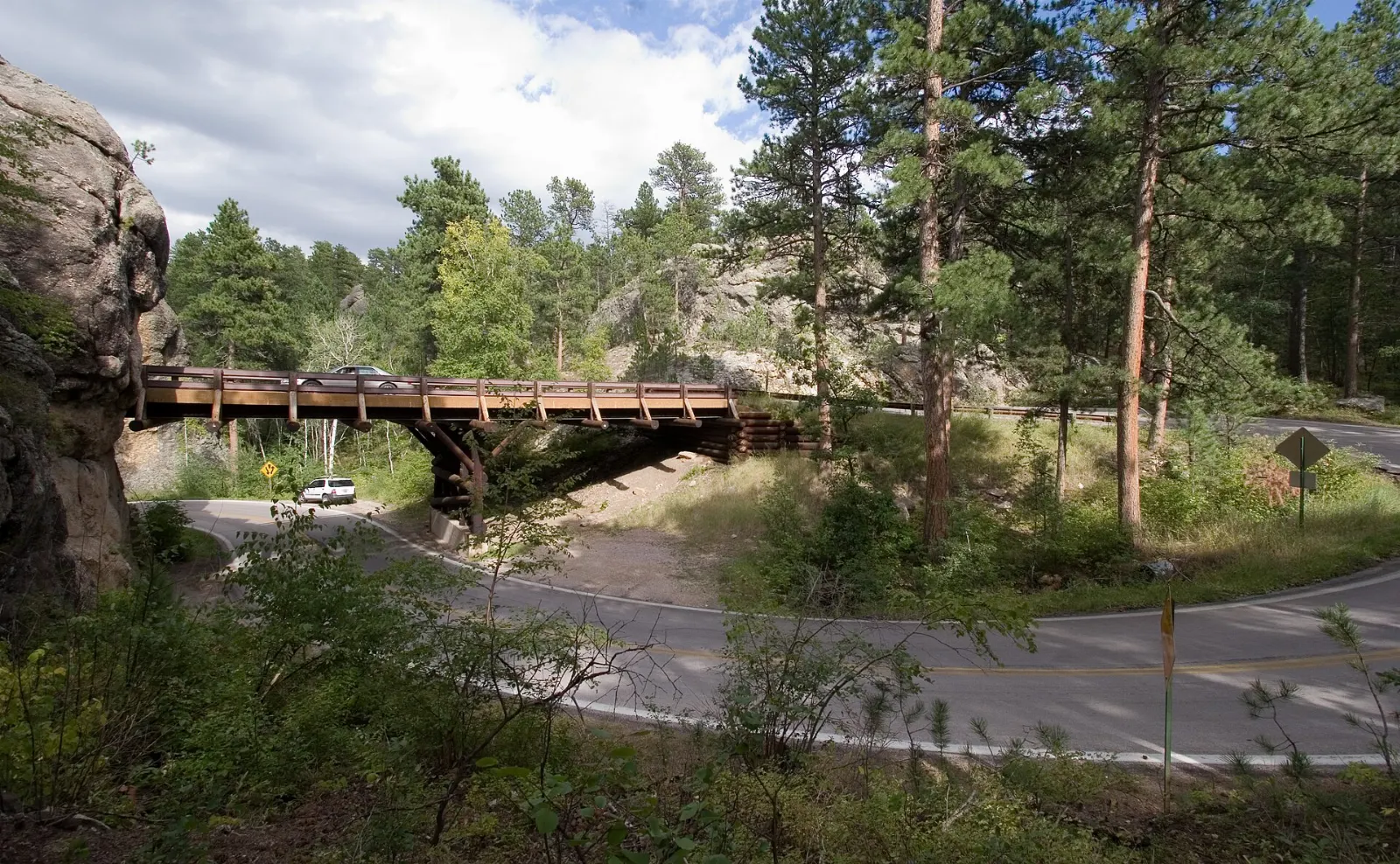 A wooden pigtail bridge spiraling over itself on Iron Mountain Road, Mount Rushmore and the Black Hills, South Dakota