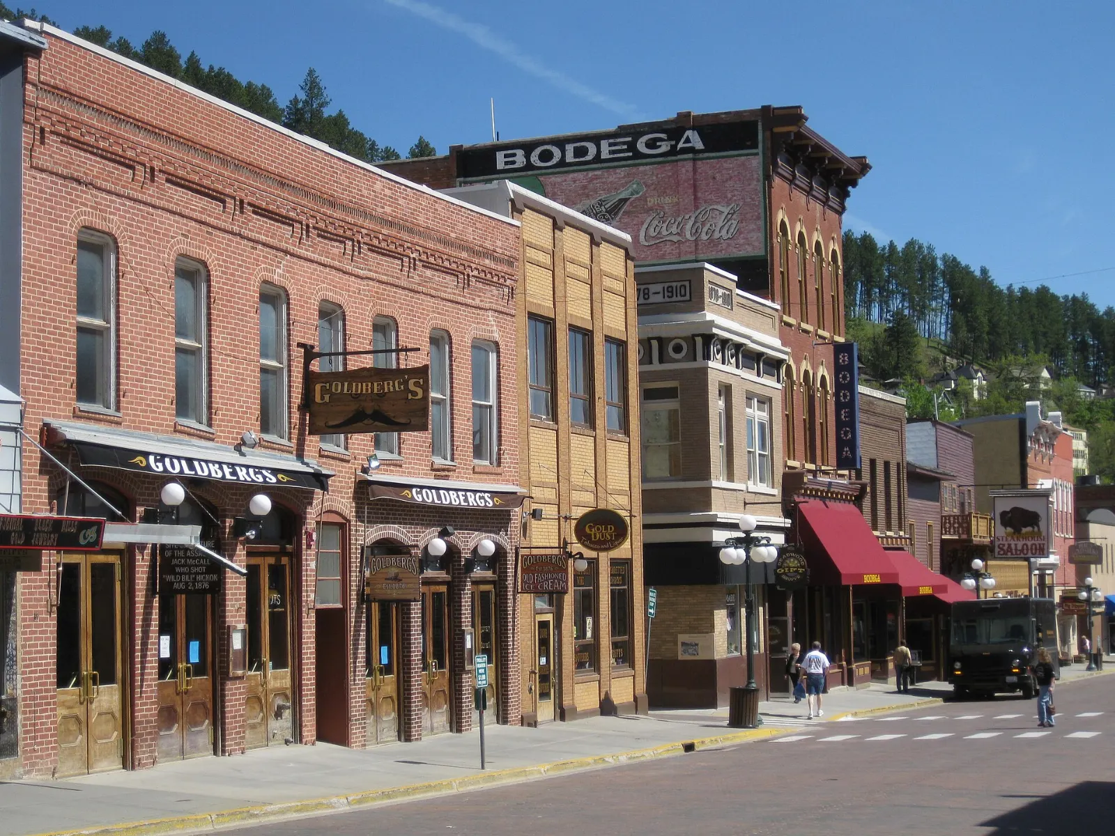 Historic brick buildings lining Main Street in Deadwood, South Dakota, Mount Rushmore and the Black Hills, South Dakota