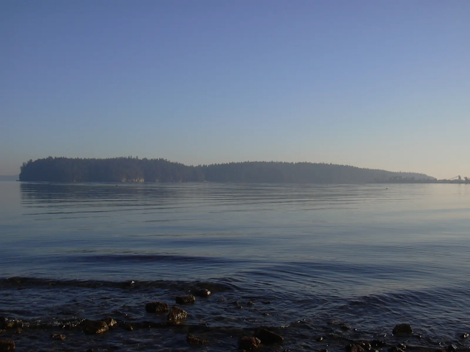 Sand and calm water at Departure Bay Beach in Nanaimo, British Columbia