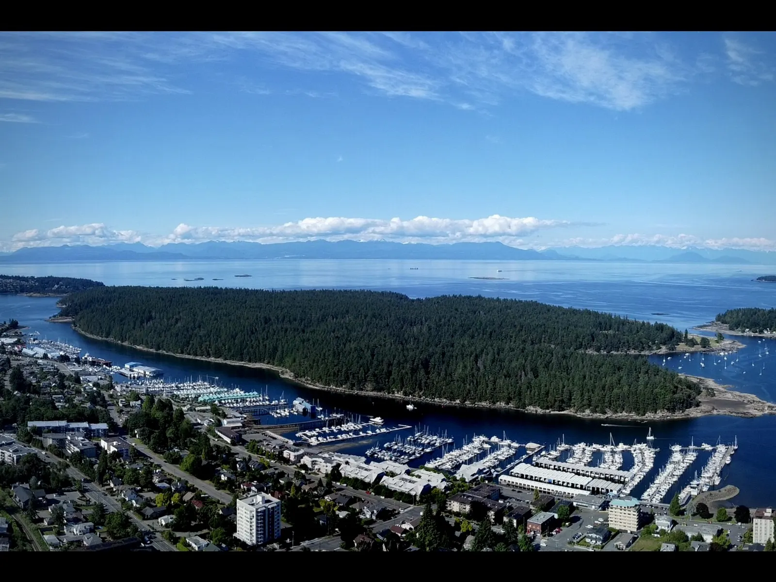 A forest trail and shoreline on Newcastle Island near Nanaimo, British Columbia
