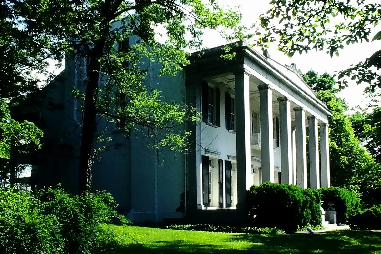 Greek Revival mansion at Belle Meade with columns and a wide lawn, Nashville, Tennessee