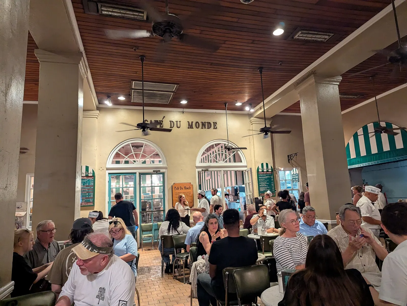 The green and white striped awning of Cafe du Monde at the French Market, New Orleans, Louisiana