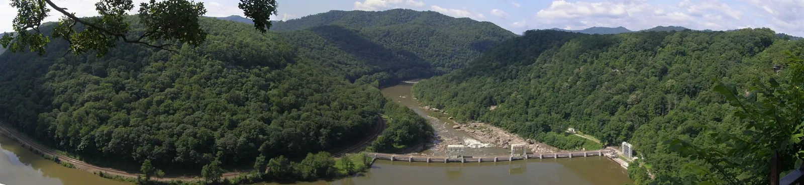 A stone overlook above a forested canyon with a river below, New River Gorge National Park, West Virginia