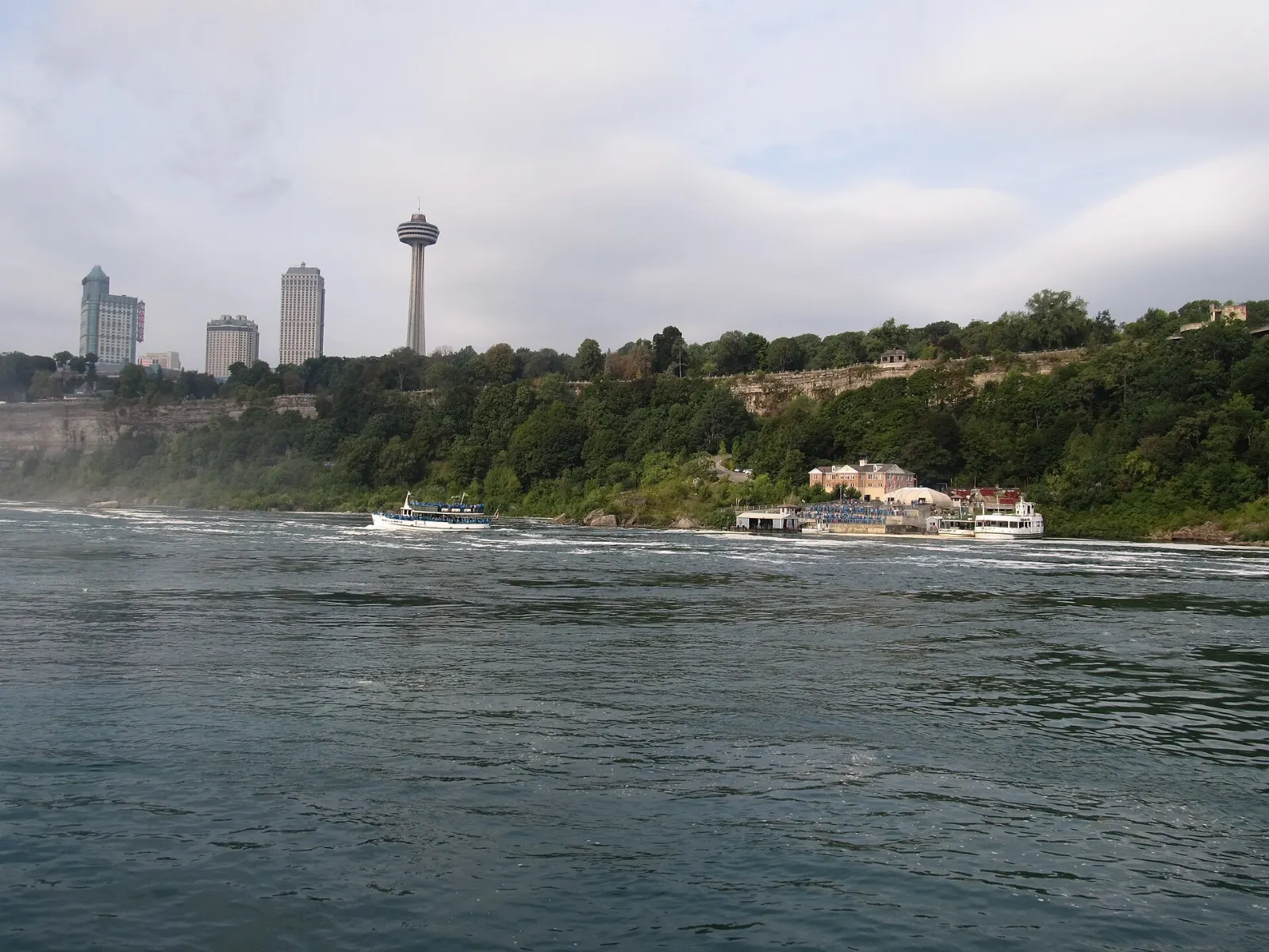 A tour boat in the spray at the foot of Horseshoe Falls, Niagara Falls, Ontario