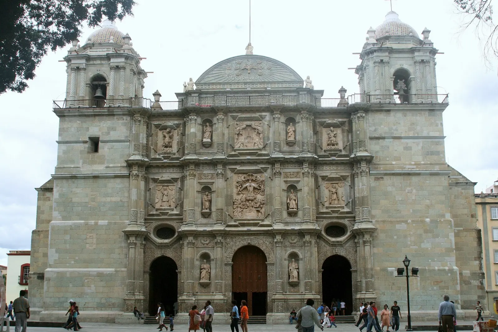 Green stone baroque facade of Oaxaca Cathedral, Mexico