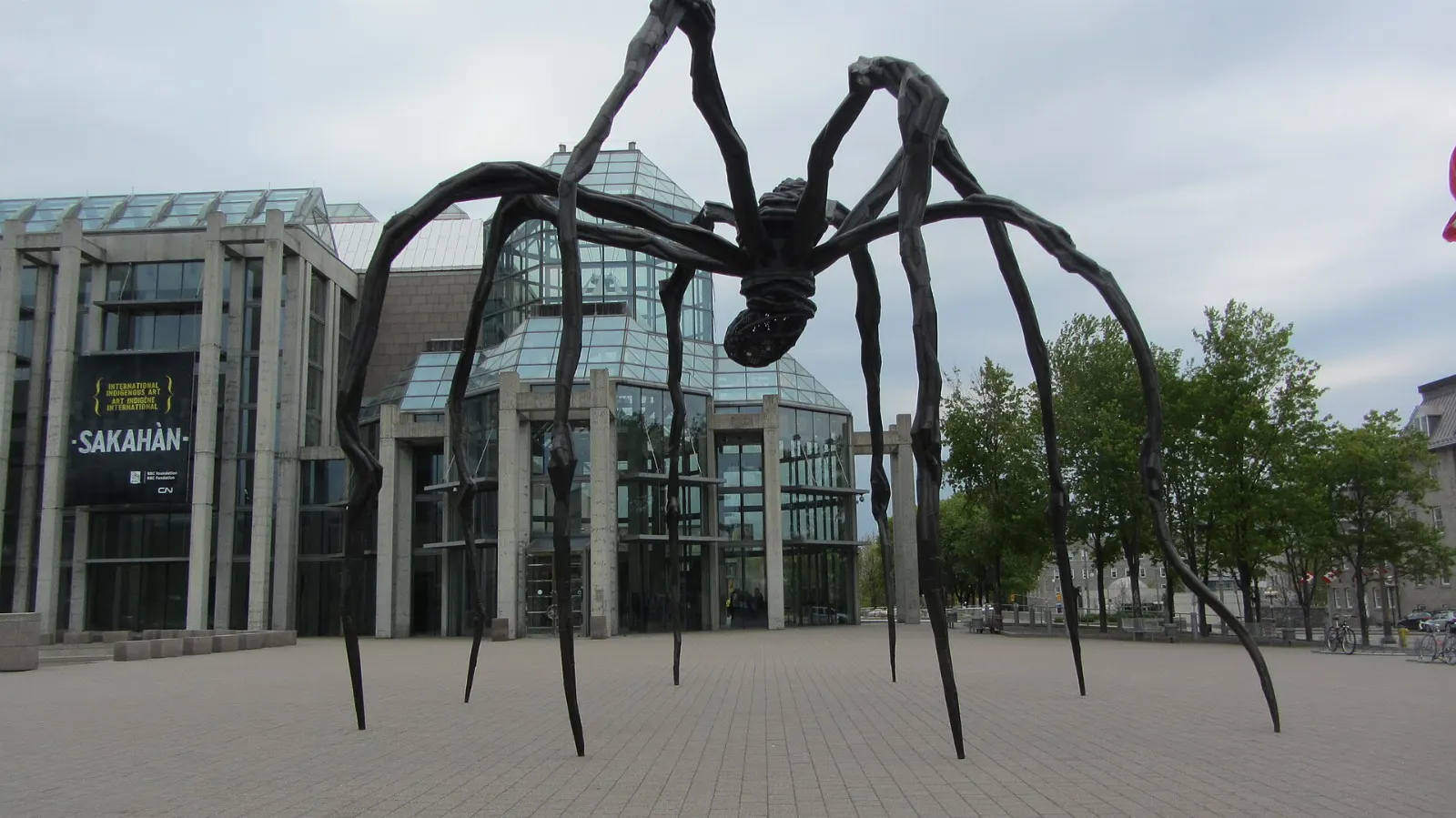 Glass tower of the National Gallery of Canada with the Maman spider sculpture, Ottawa, Ontario