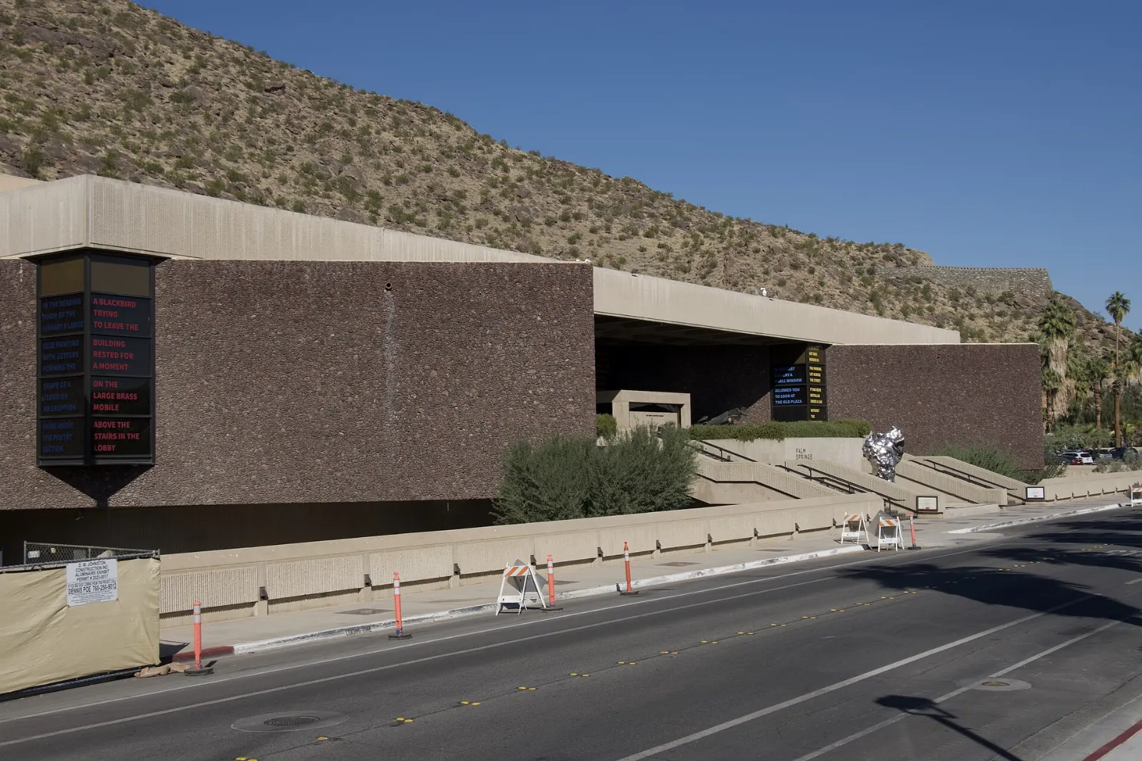 The dark stone modernist facade of the Palm Springs Art Museum downtown, California