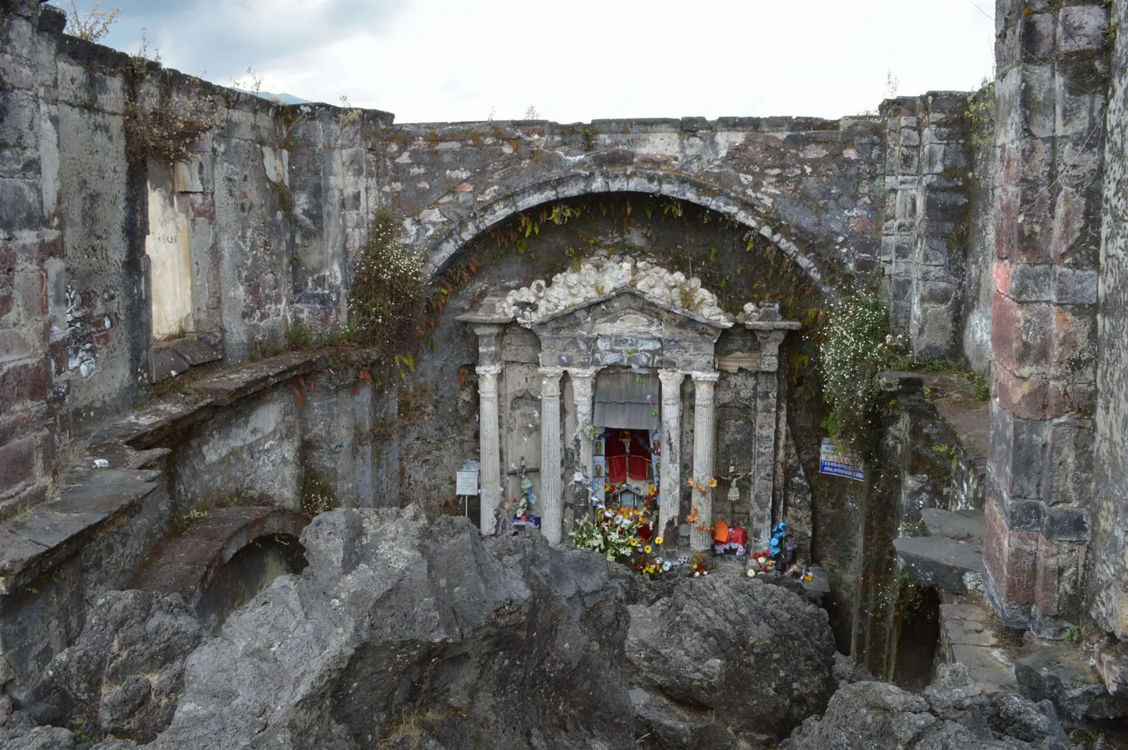 The church of San Juan Parangaricutiro emerging from hardened black lava, Paricutín, Michoacán