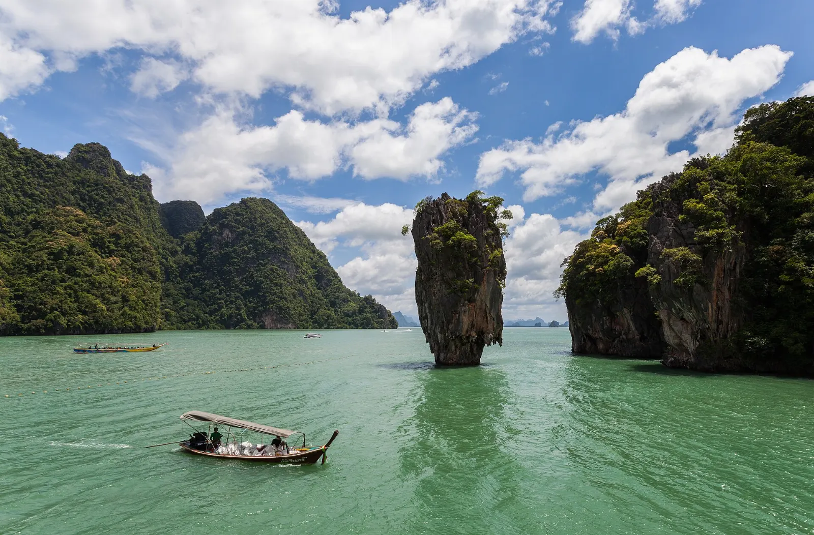 Narrow limestone pinnacle of Ko Tapu rising from the water beside Khao Phing Kan, Phuket, Thailand
