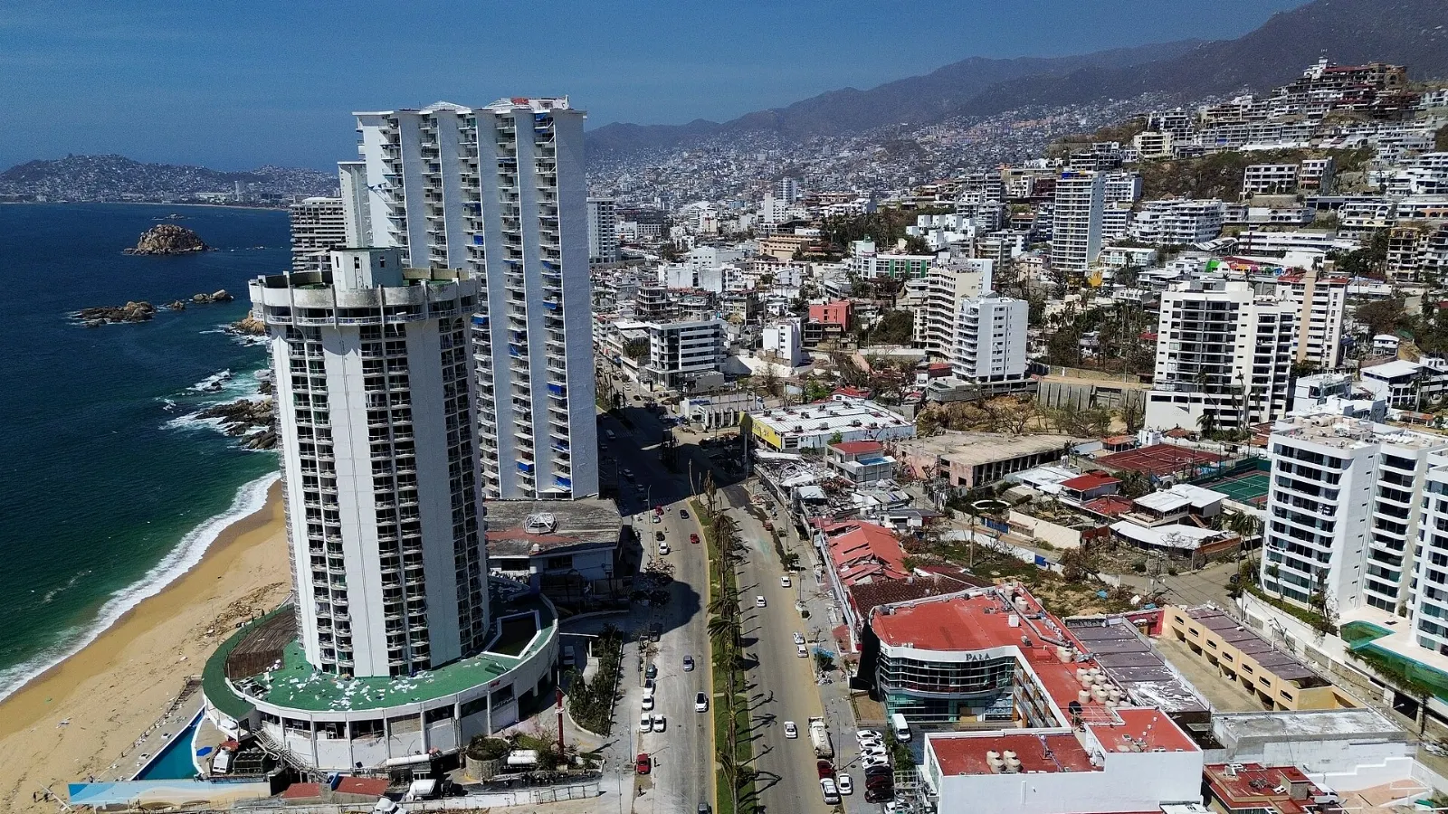 Skyline and boulevard curving around Acapulco Bay, Pie de la Cuesta, Guerrero