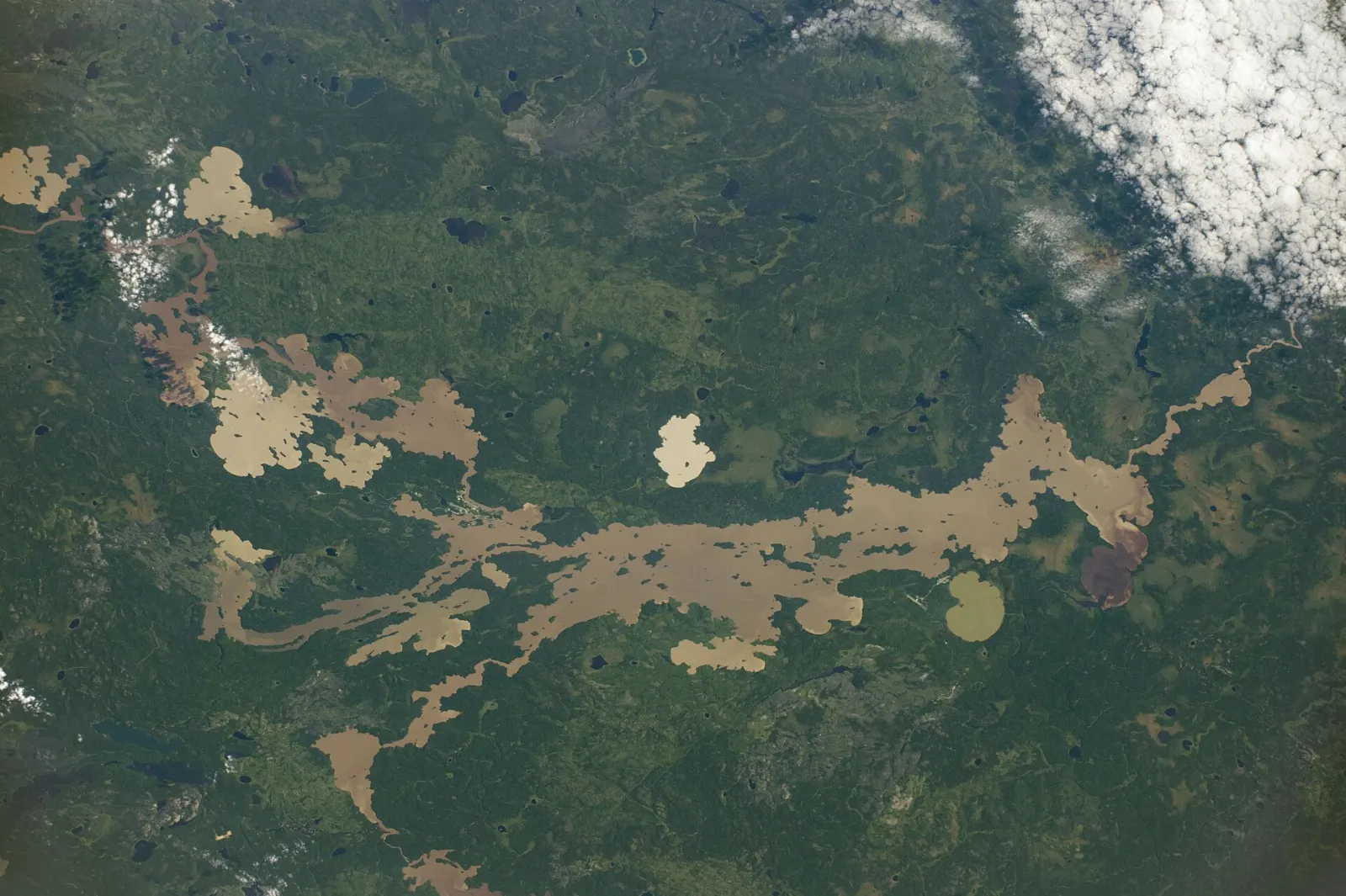 Beach and shallow water at Sandy Lake in Prince Albert National Park, Saskatchewan