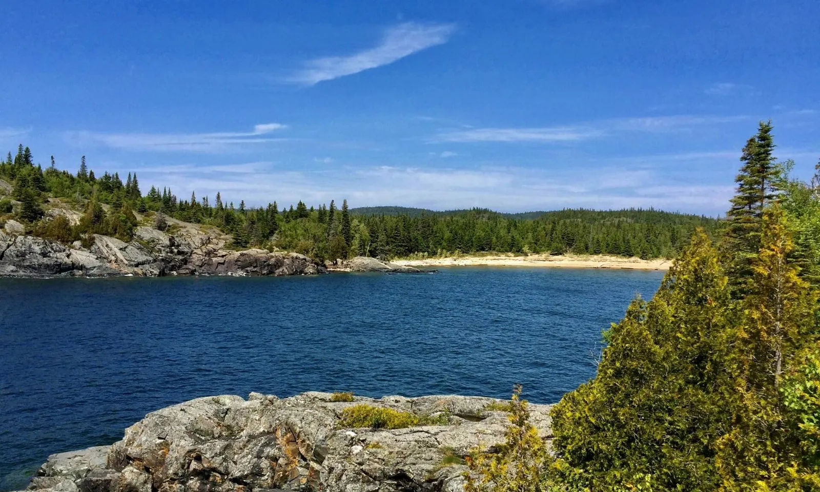 Cobble beach with ancient rock pits in Pukaskwa, Pukaskwa National Park, Ontario