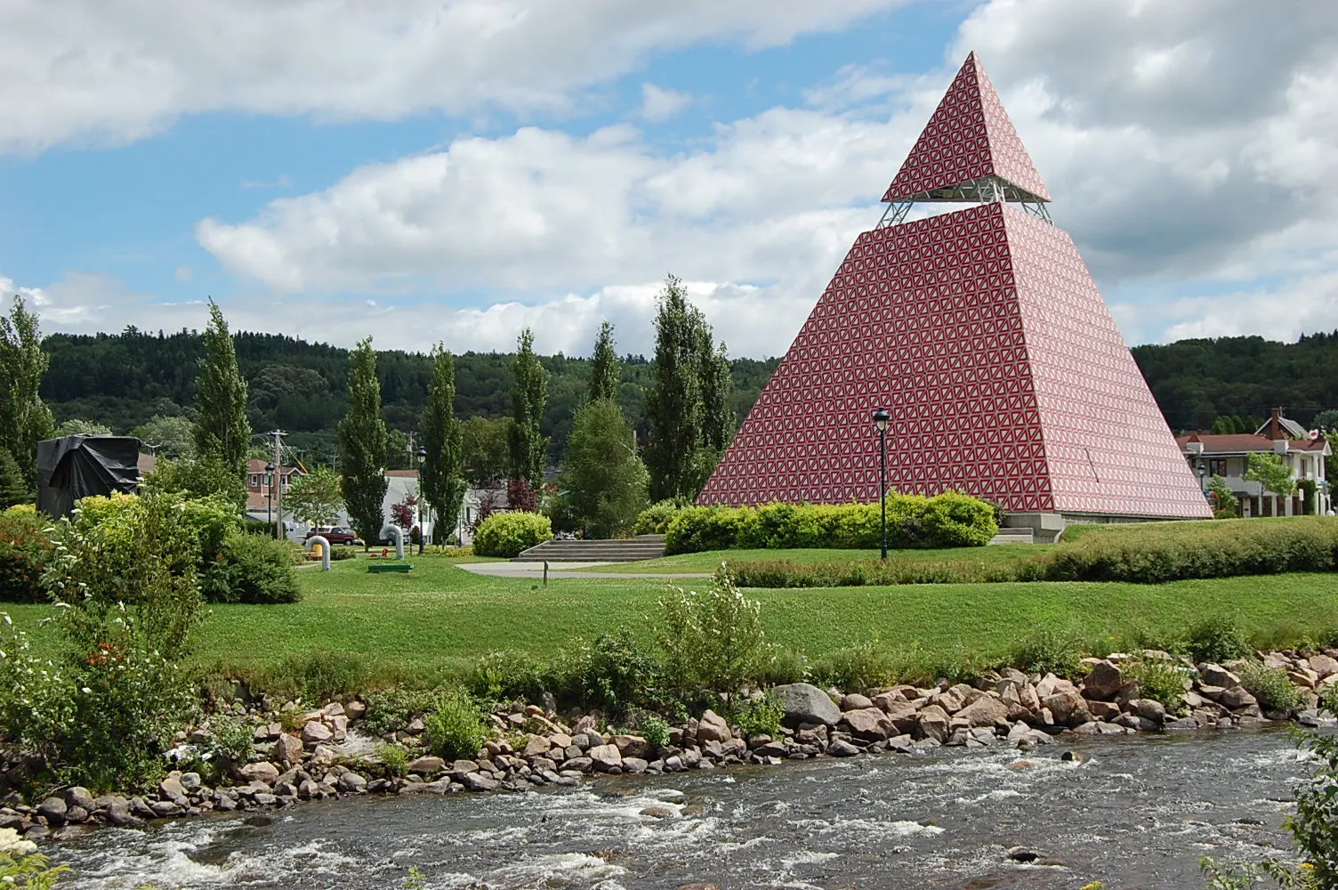 Aluminium pyramid in the Parc des Ha! Ha! beside the river, Saguenay Fjord, Quebec