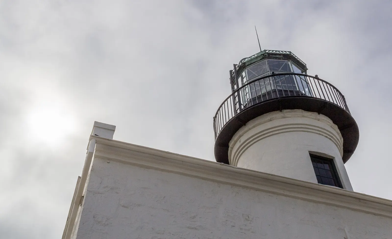 White Old Point Loma Lighthouse on the ridge of Point Loma above the Pacific, San Diego, California