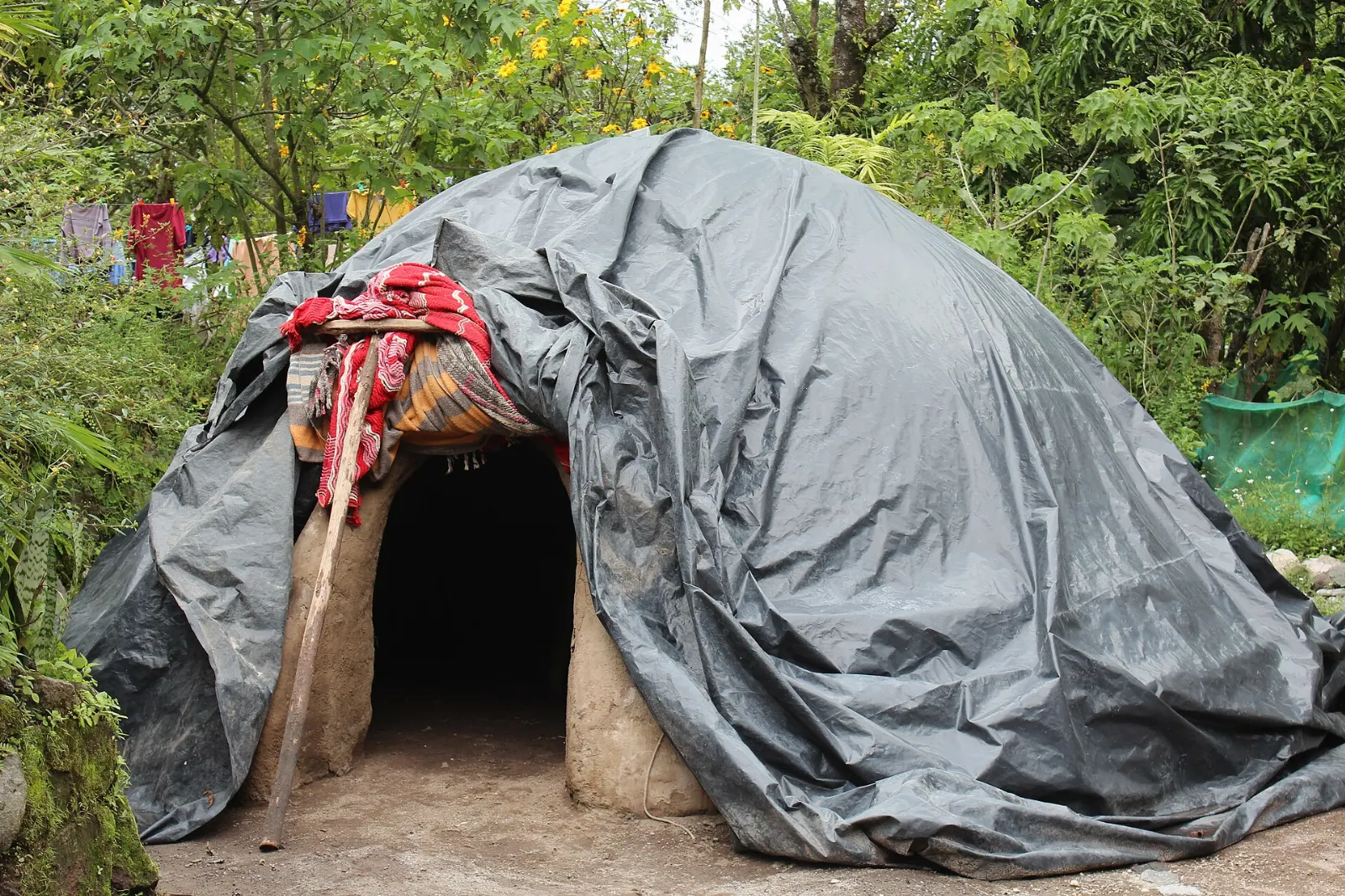 Entrance to a traditional temazcal with volcanic stones, San José del Pacífico, Oaxaca