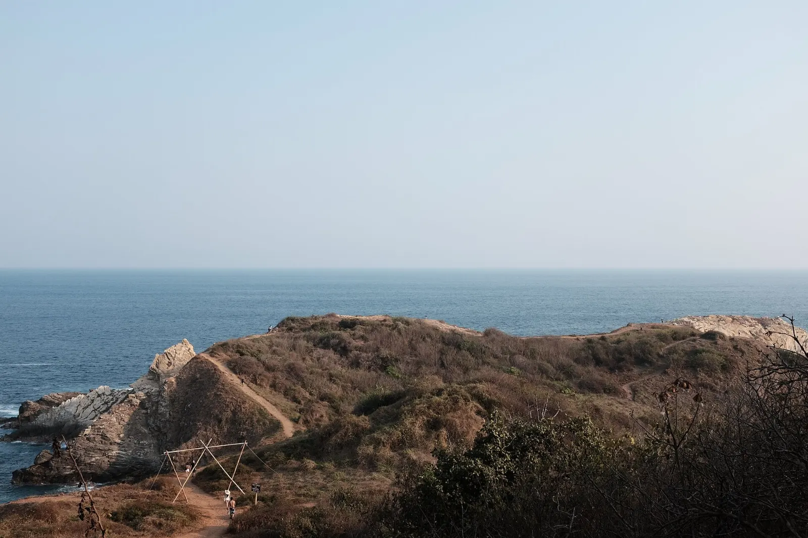 Rocky headland of Punta Cometa at the Pacific shore, San José del Pacífico, Oaxaca
