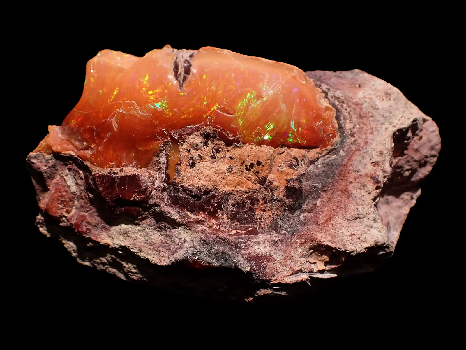 Polished Mexican opal showing shifting colors, San Juan del Río, Querétaro