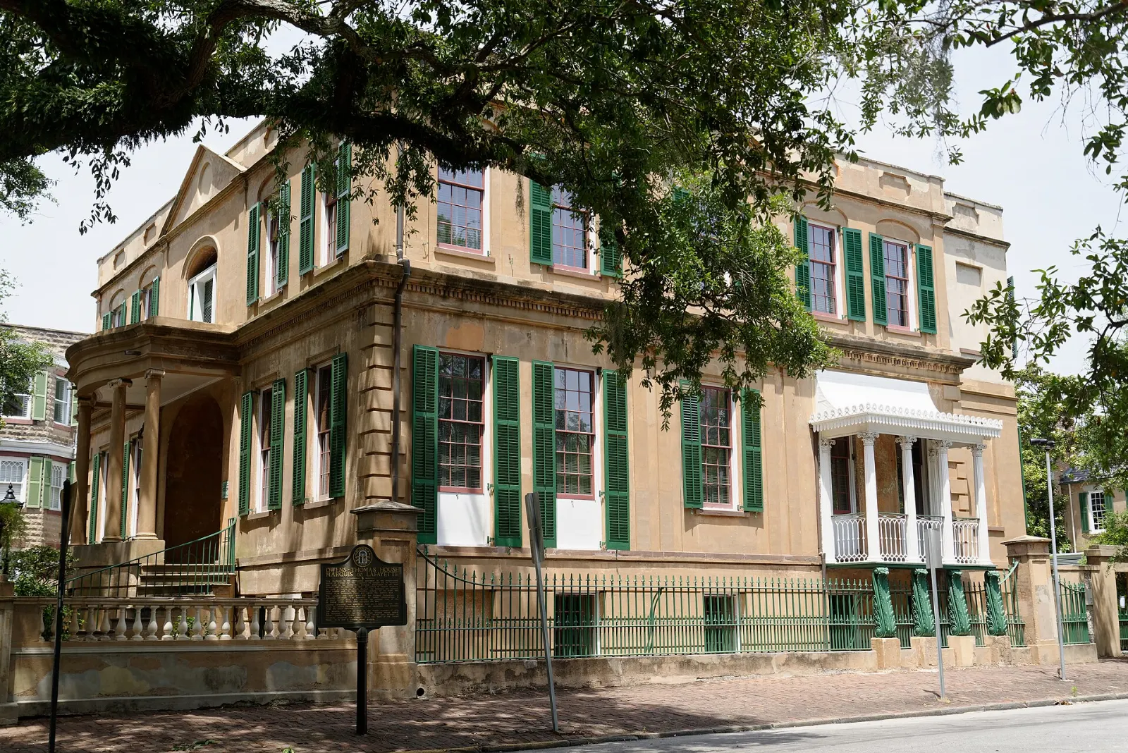 The pale stucco Regency-style Owens-Thomas House facing Oglethorpe Square, Savannah, Georgia