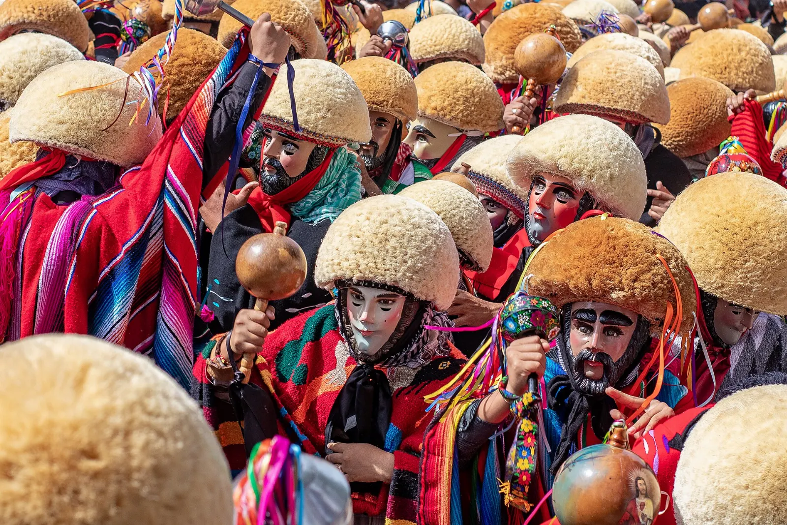 Parachico dancers in carved masks during the Fiesta Grande, Sumidero Canyon, Chiapas