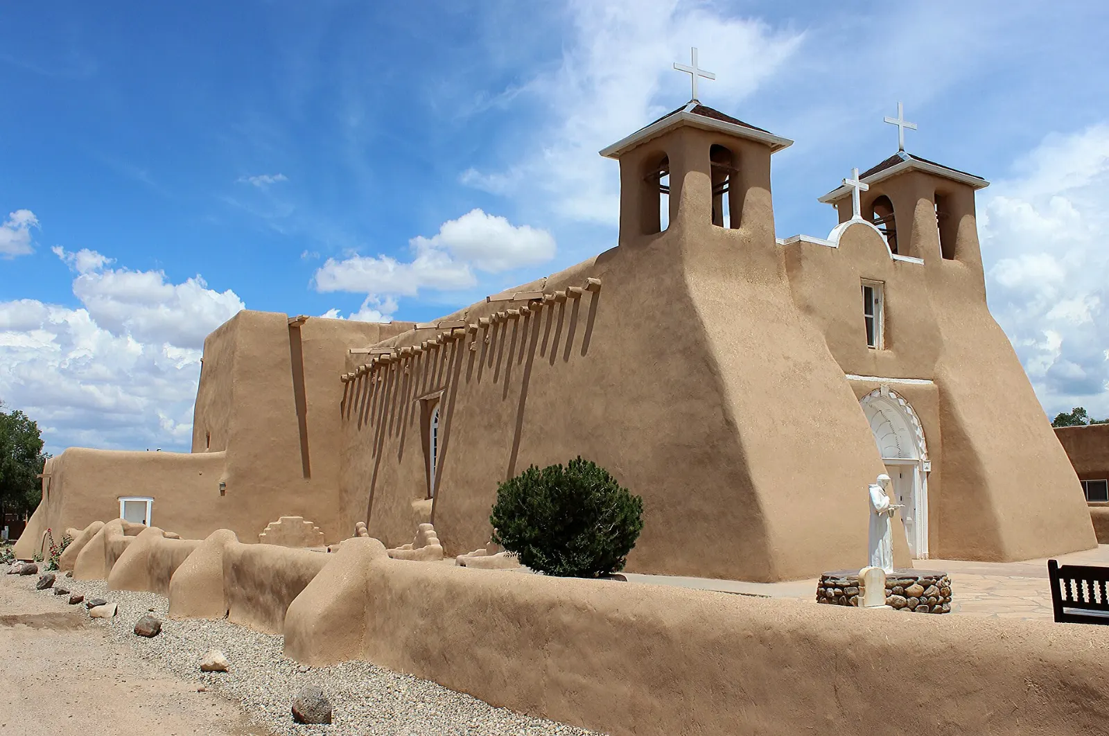 The massive sculpted adobe buttresses at the back of the Ranchos de Taos church, New Mexico
