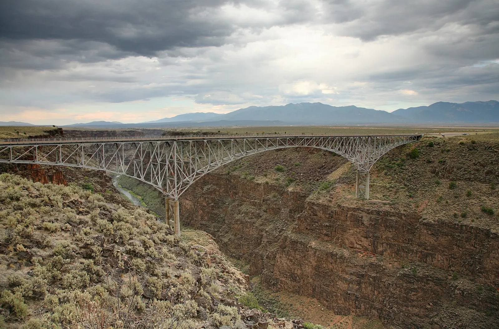 The steel Rio Grande Gorge Bridge spanning a deep basalt canyon, Taos, New Mexico