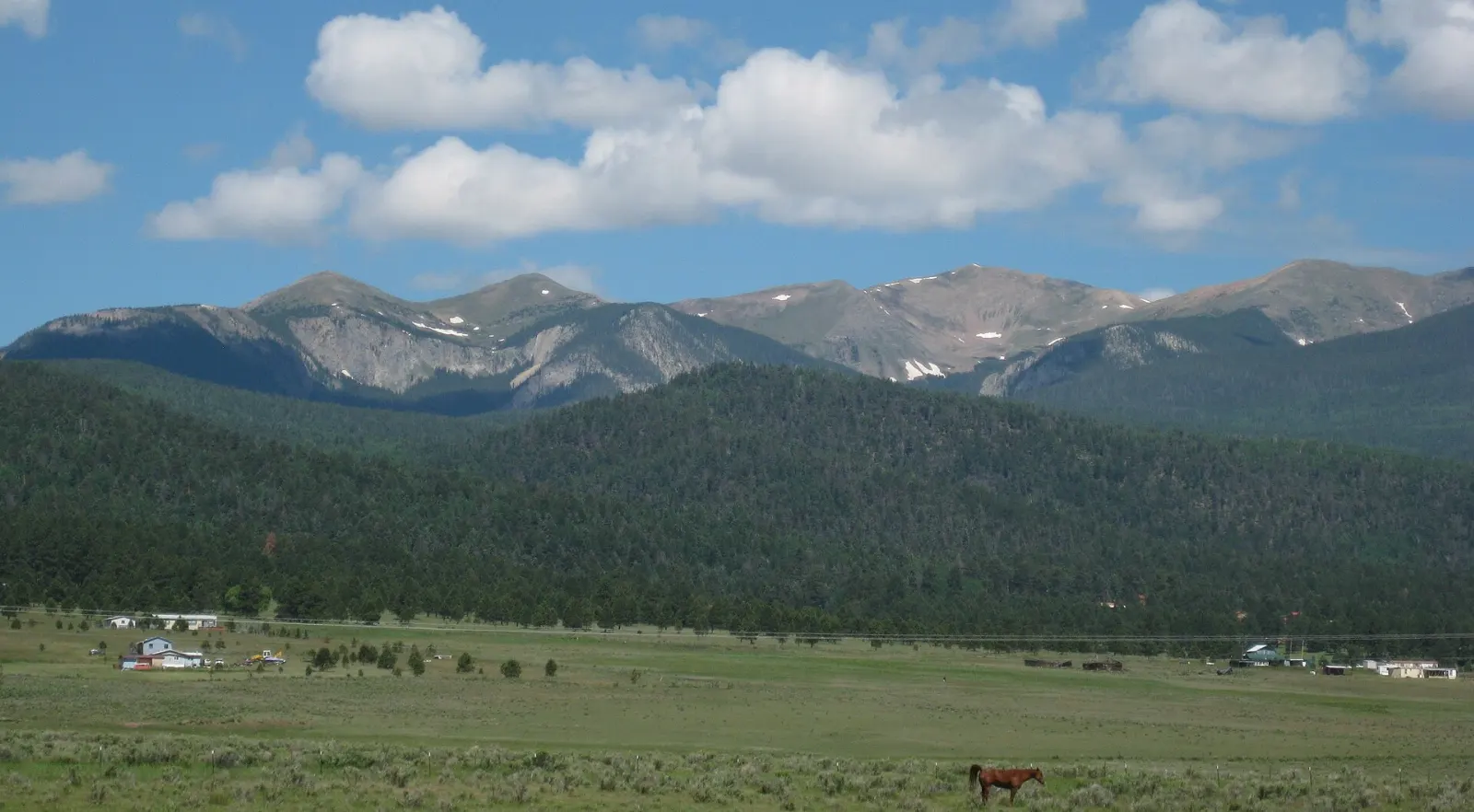 The rocky summit ridge of Wheeler Peak above alpine meadows, Taos, New Mexico