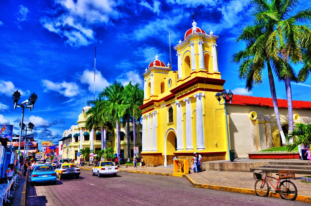 The white facade and bell towers of the San Agustín church in Tapachula, Chiapas