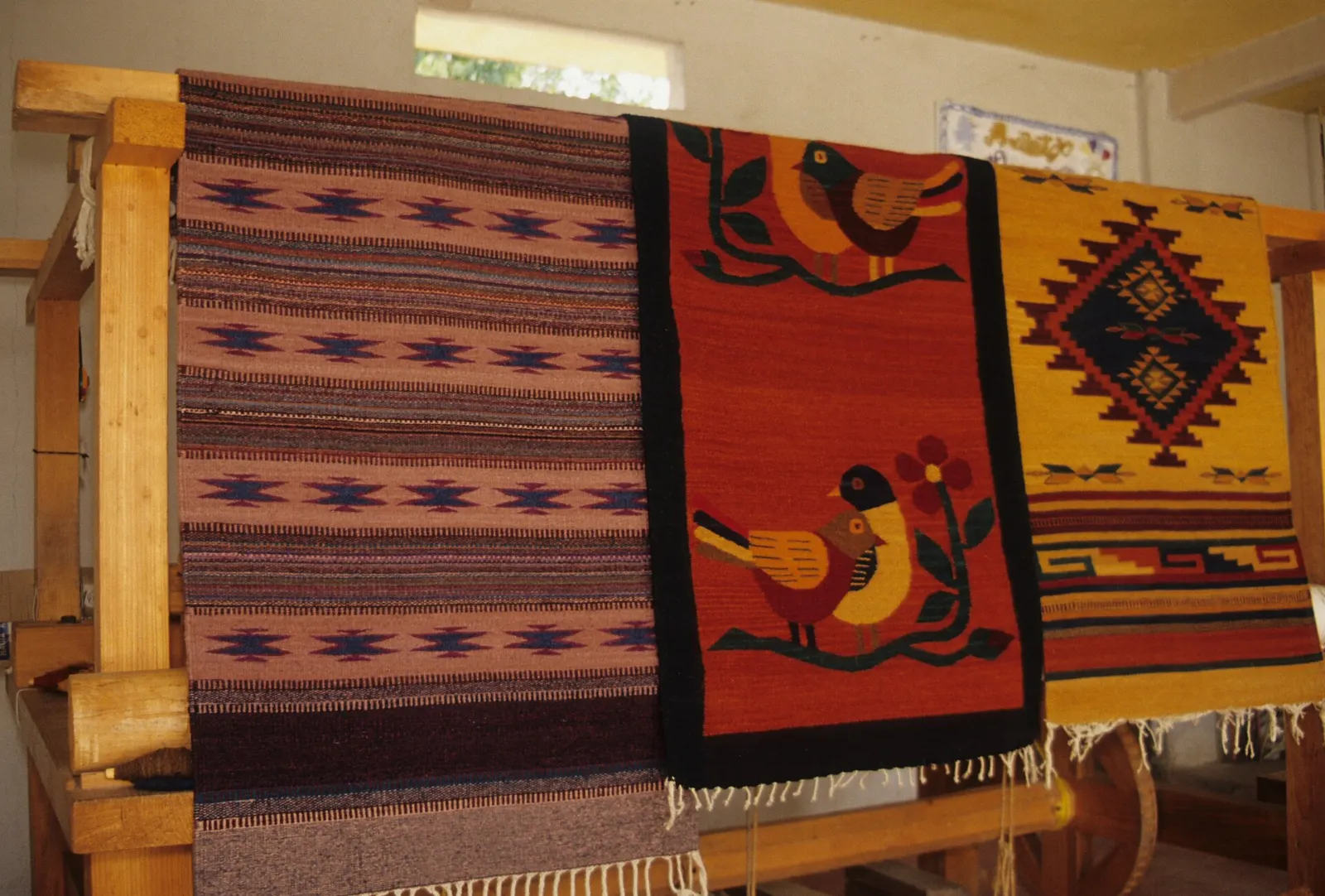 Woven wool rugs with geometric Zapotec patterns on display, Teotitlán del Valle, Oaxaca