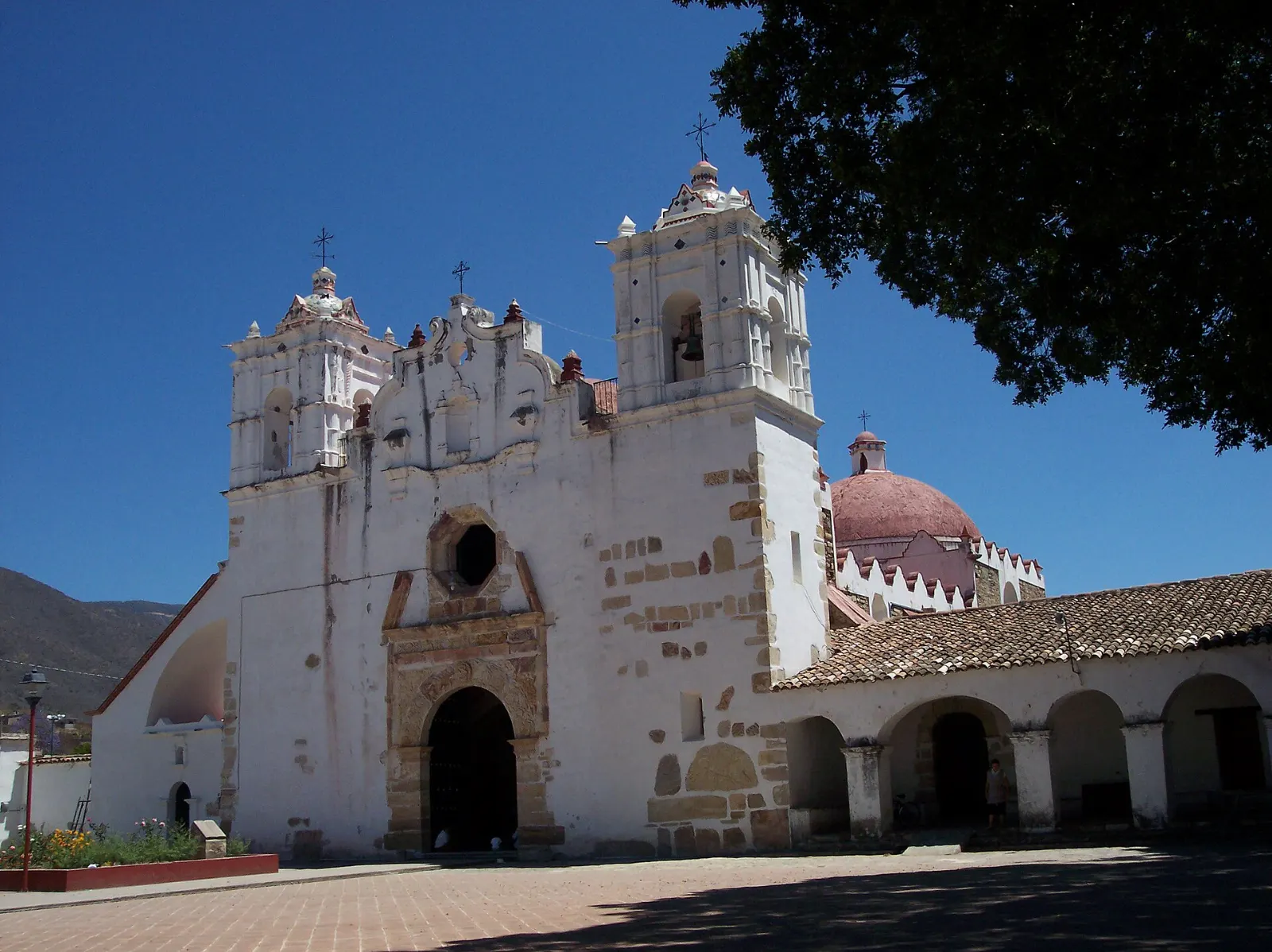 Stone facade of the Preciosa Sangre de Cristo church in Teotitlán del Valle, Oaxaca