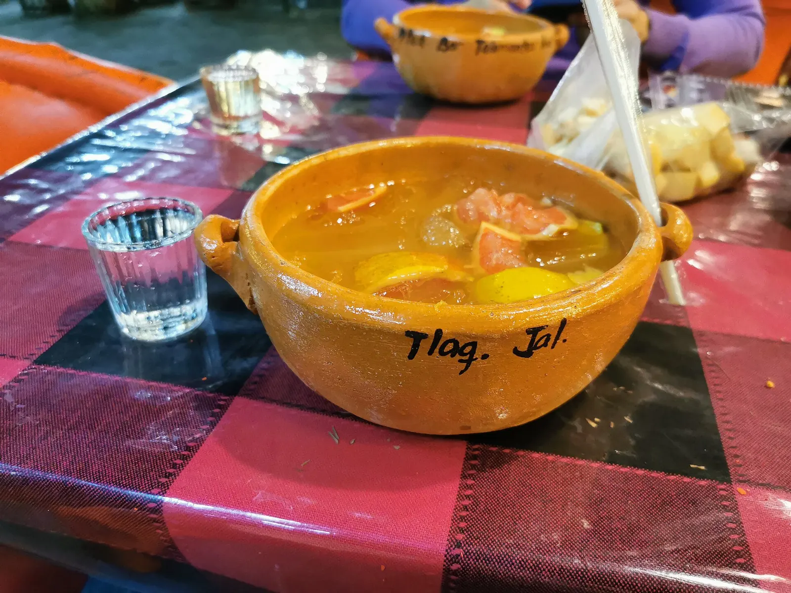 A cantarito cocktail served in a clay cup with citrus and salt, Tequila, Jalisco